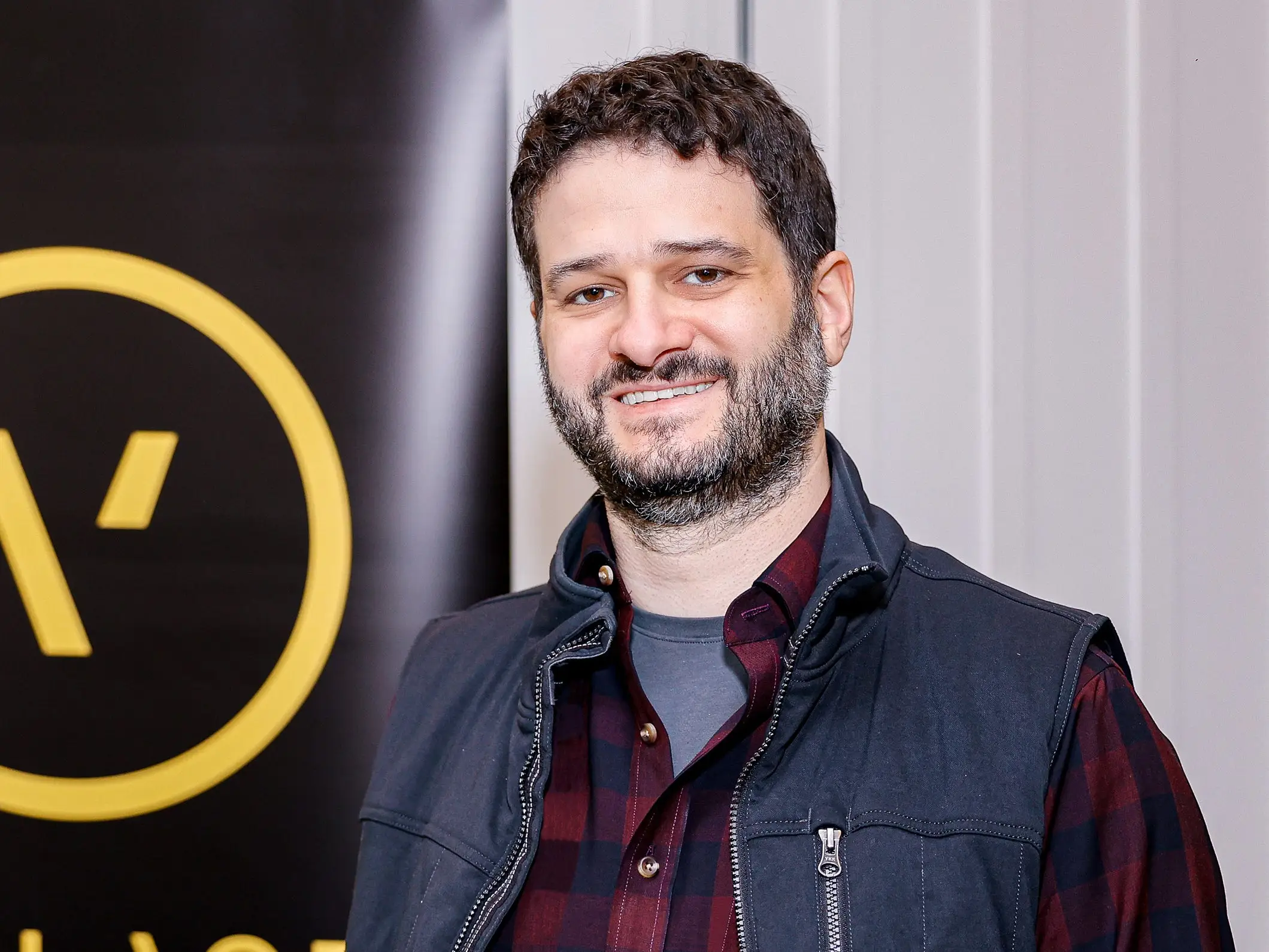 Facebook cofounder Dustin Moskovitz poses in front of 'Village' sign at Carneros Resort and Spa.