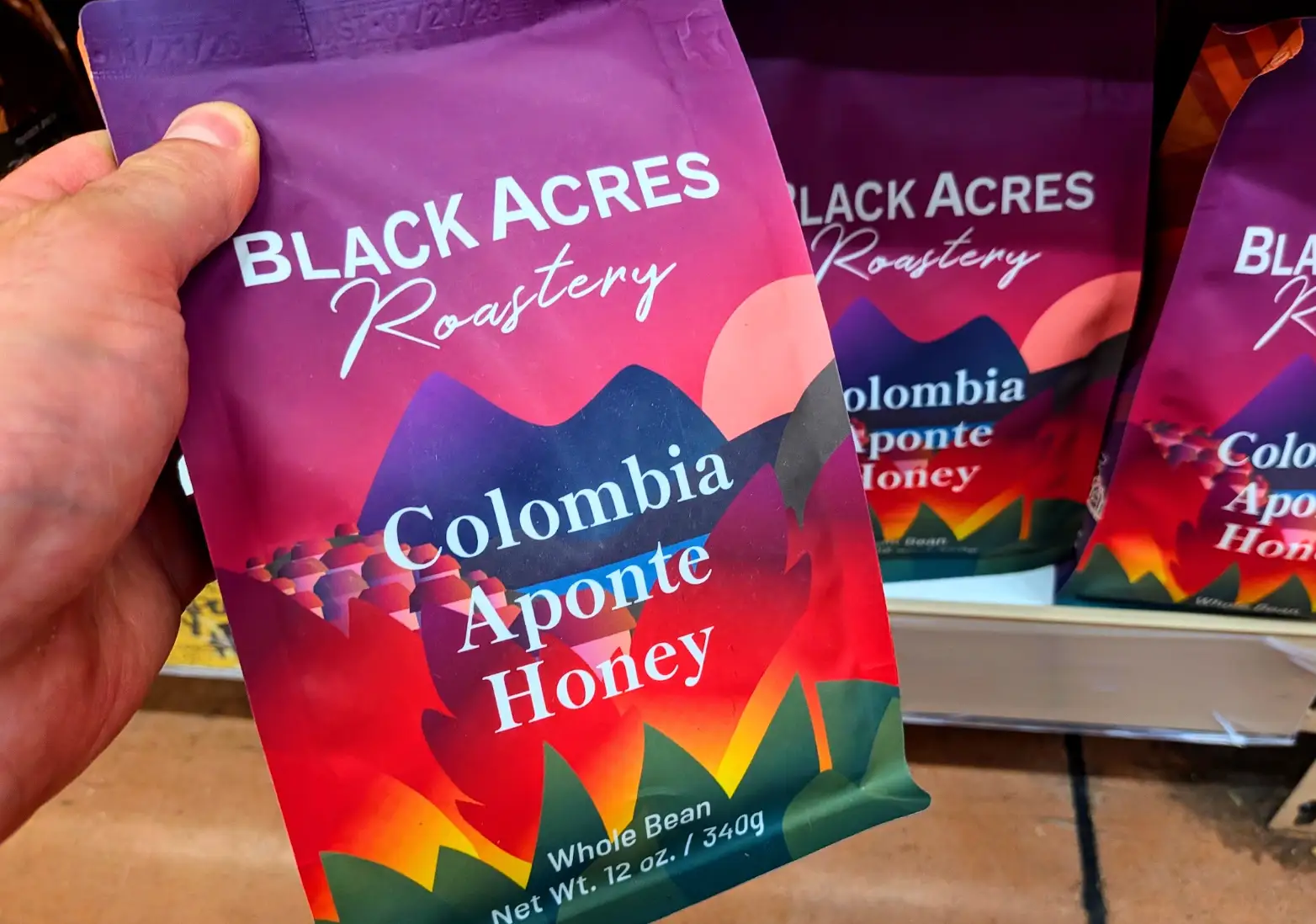 A bag of Black Acres Roastery Colombia Aponte Honey coffee.