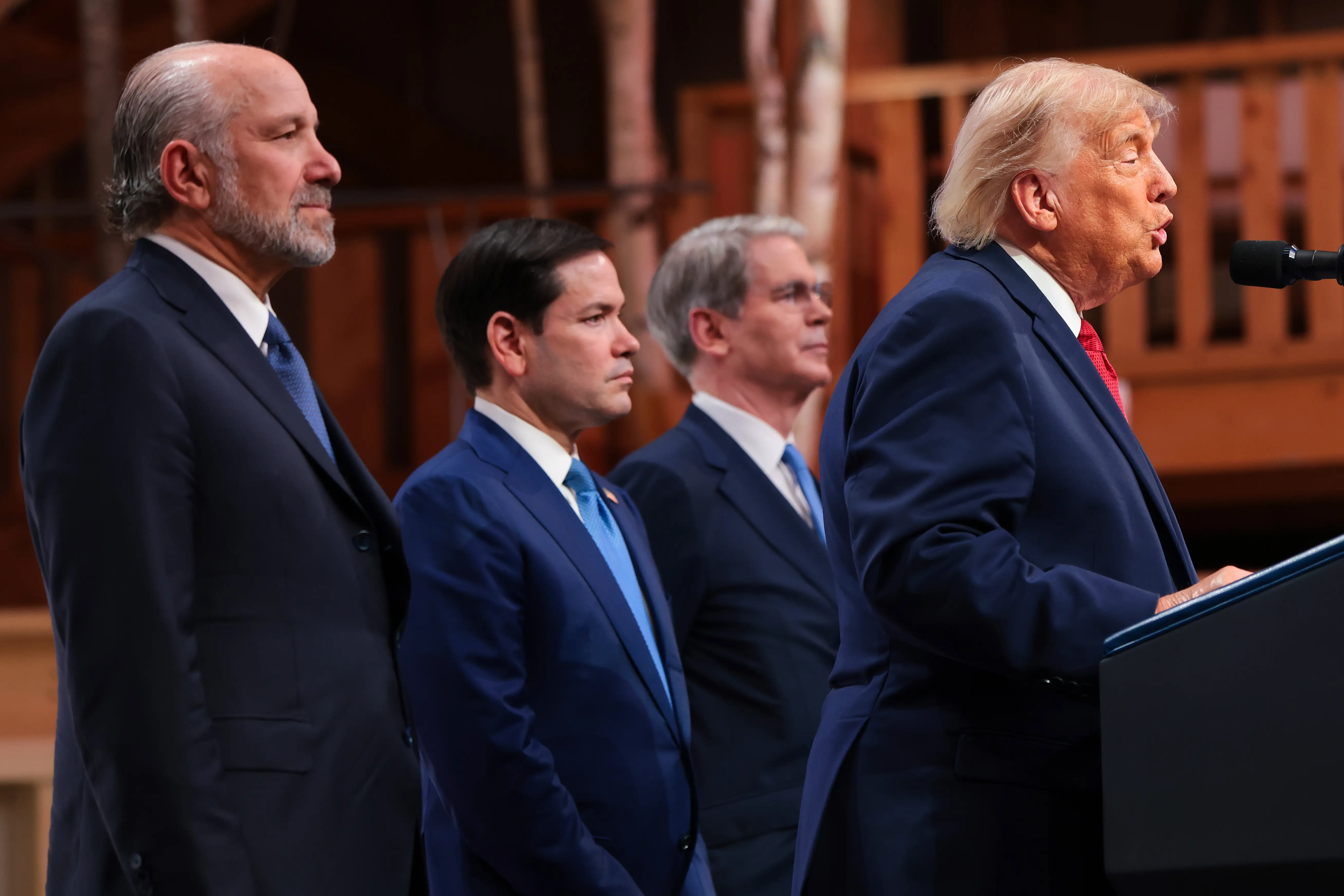 U.S. President Donald Trump (R) is joined by (L-R) U.S. Commerce Secretary Howard Lutnick, U.S. Secretary of State Marco Rubio and U.S. Treasury Secretary Scott Bessent as he speaks at a press conference during the G7 Leaders' Summit on June 17, 2026