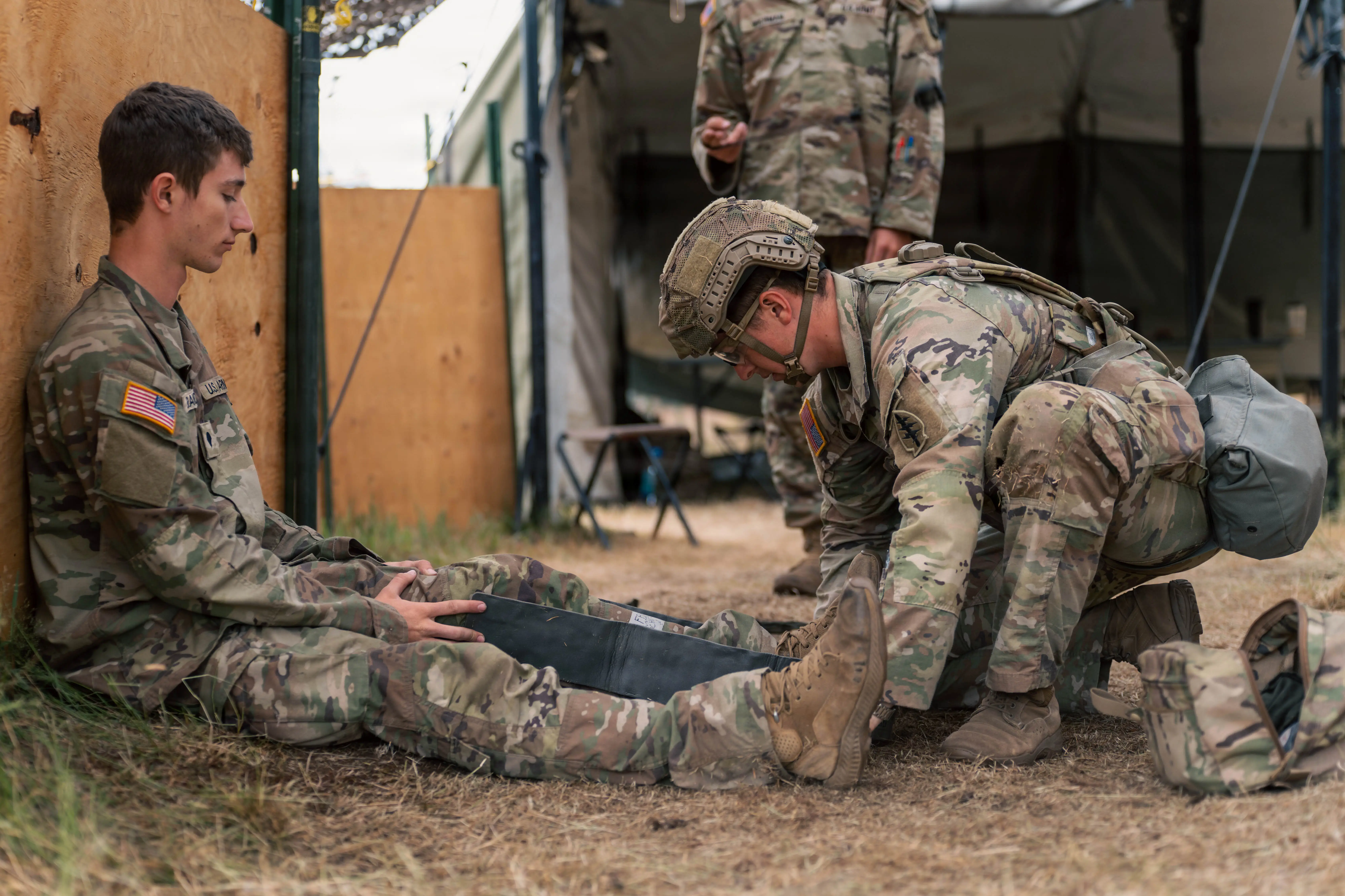 A soldier with the 1st Special Forces Group adjusts a leg splint during medical training at Joint Base Lewis-McChord, Washington, June 25, 2026.