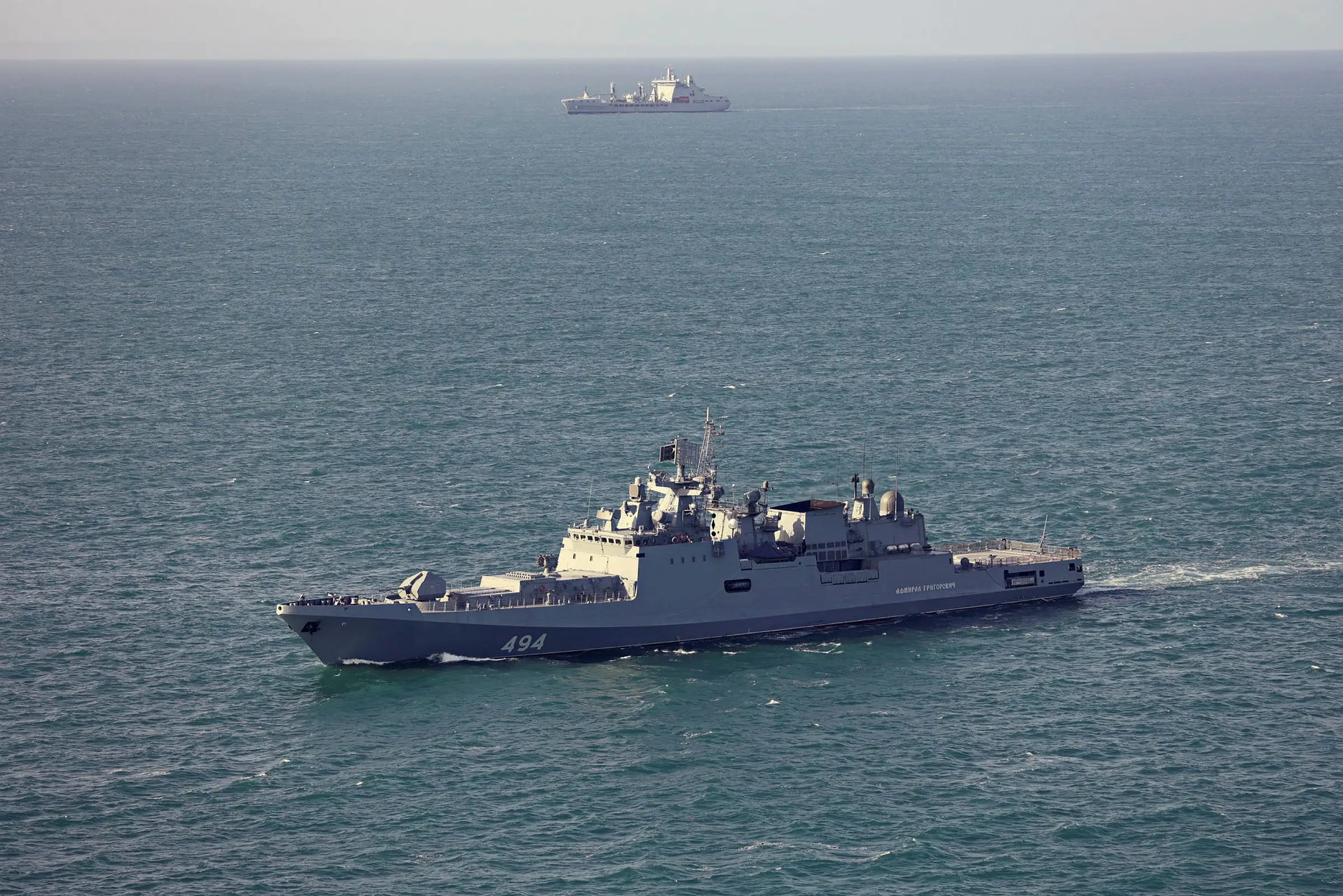 In this undated handout image provided by the UK Ministry of Defense, the Russian frigate Admiral Grigorovich (foreground) is monitored by the Royal Navy's RFA Tideforce (background).