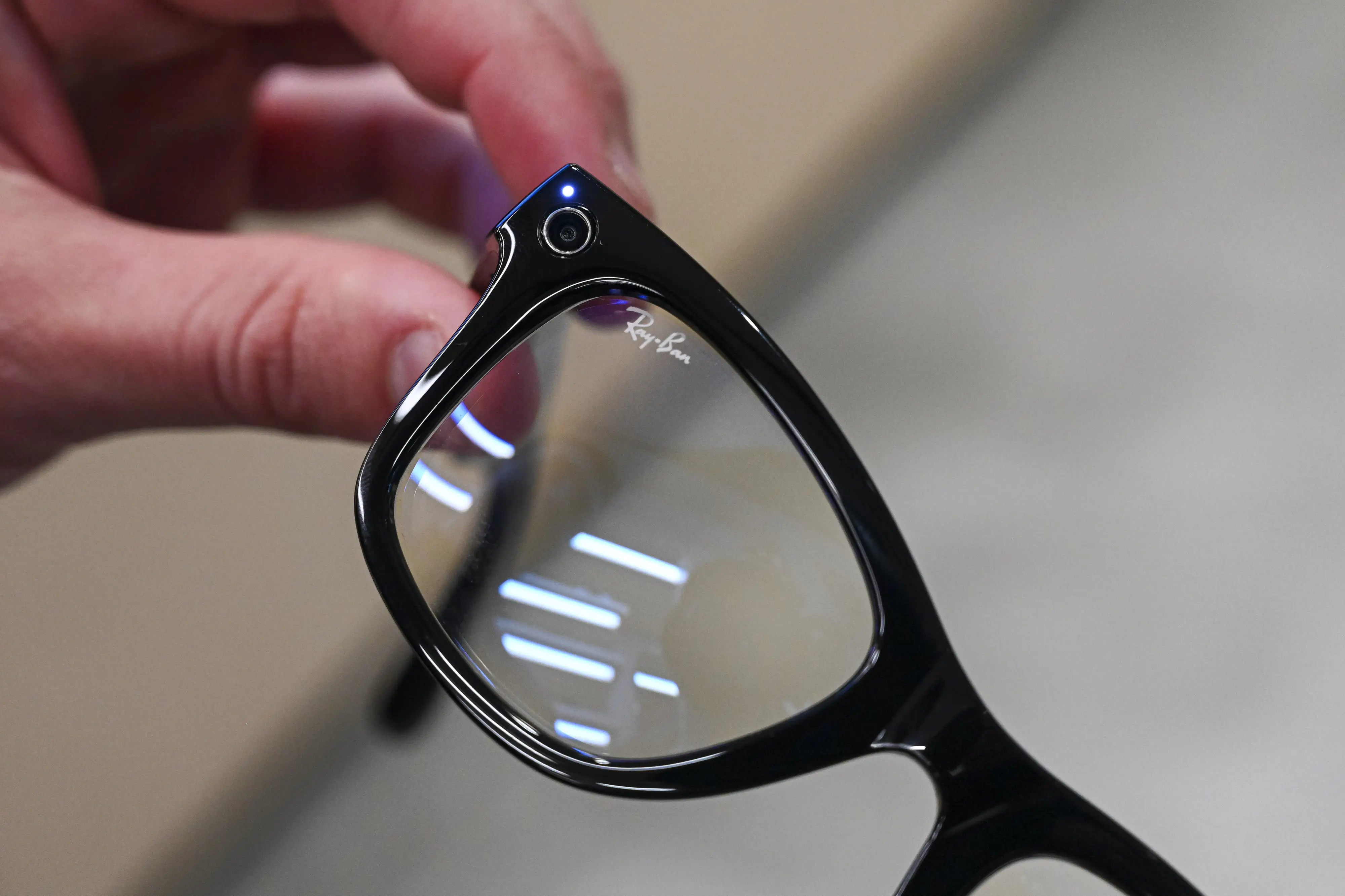 The indicator light on a pair of Meta Ray-Ban glasses.