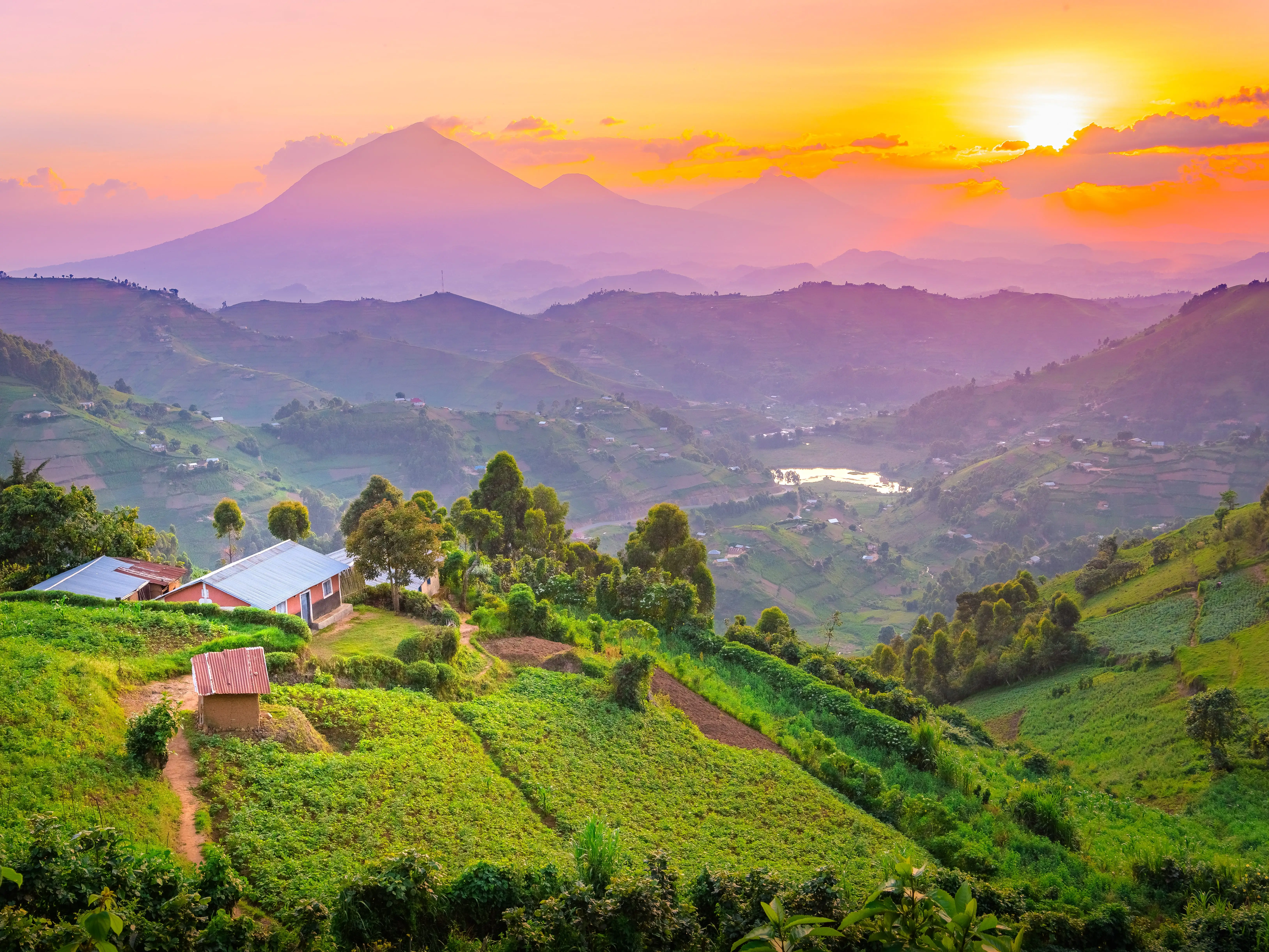 African village in the mountains at sunset stock photo