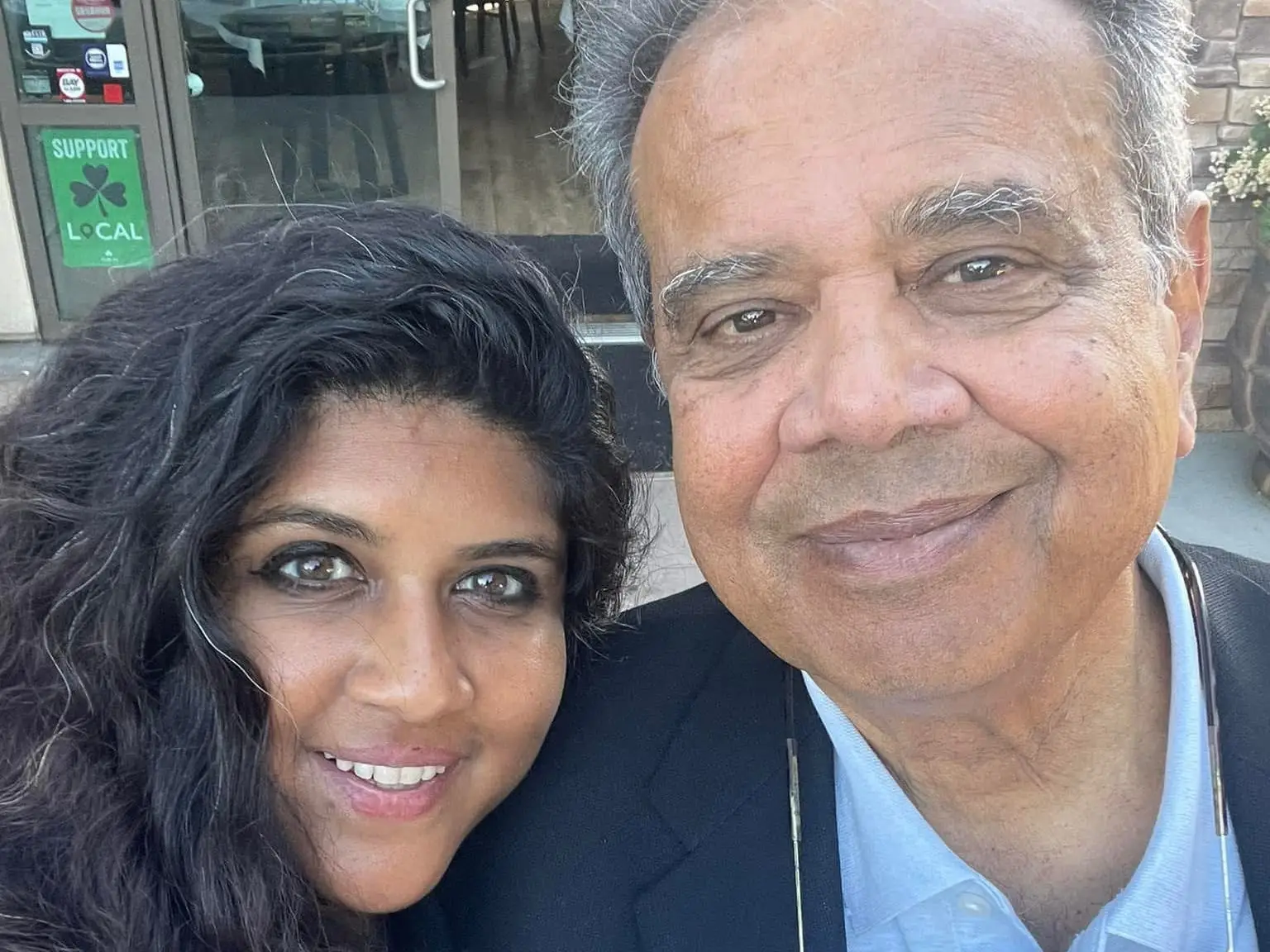 A father and daughter in a selfie.