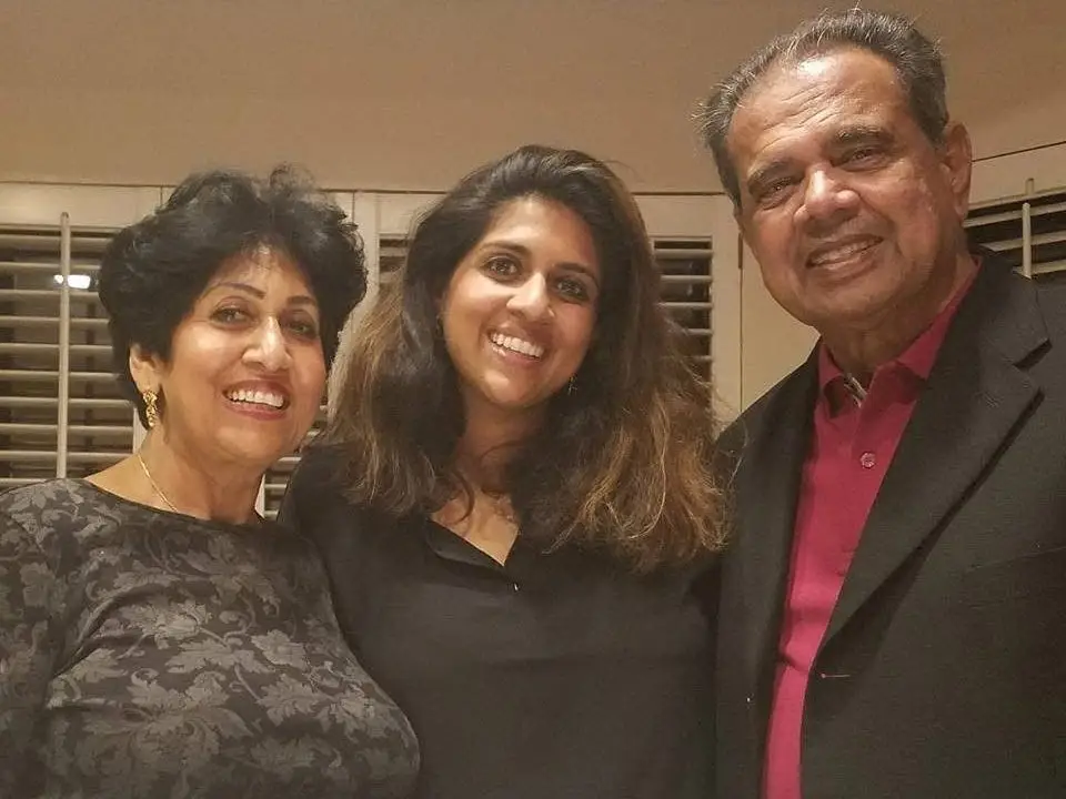 A daughter with her parents.