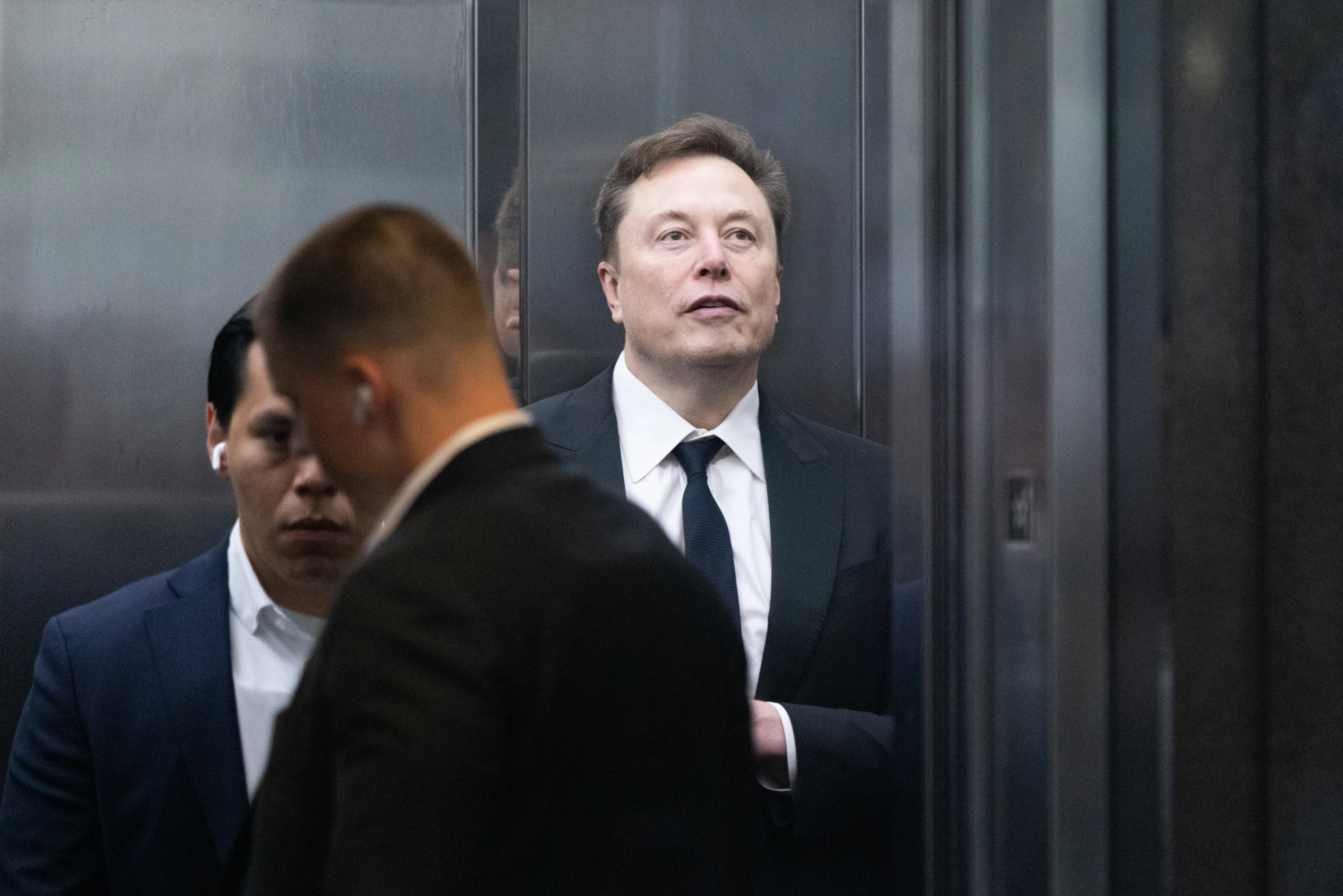 Elon Musk arrives to court at the Ronald V. Dellums Federal Building on April 30, 2026 in Oakland, California. Elon Musk invested in OpenAI early on believing it would be a non-profit, but is now suing OpenAI and its CEO Sam Altman for allegedly deceiving him by developing OpenAI into a for-profit company.