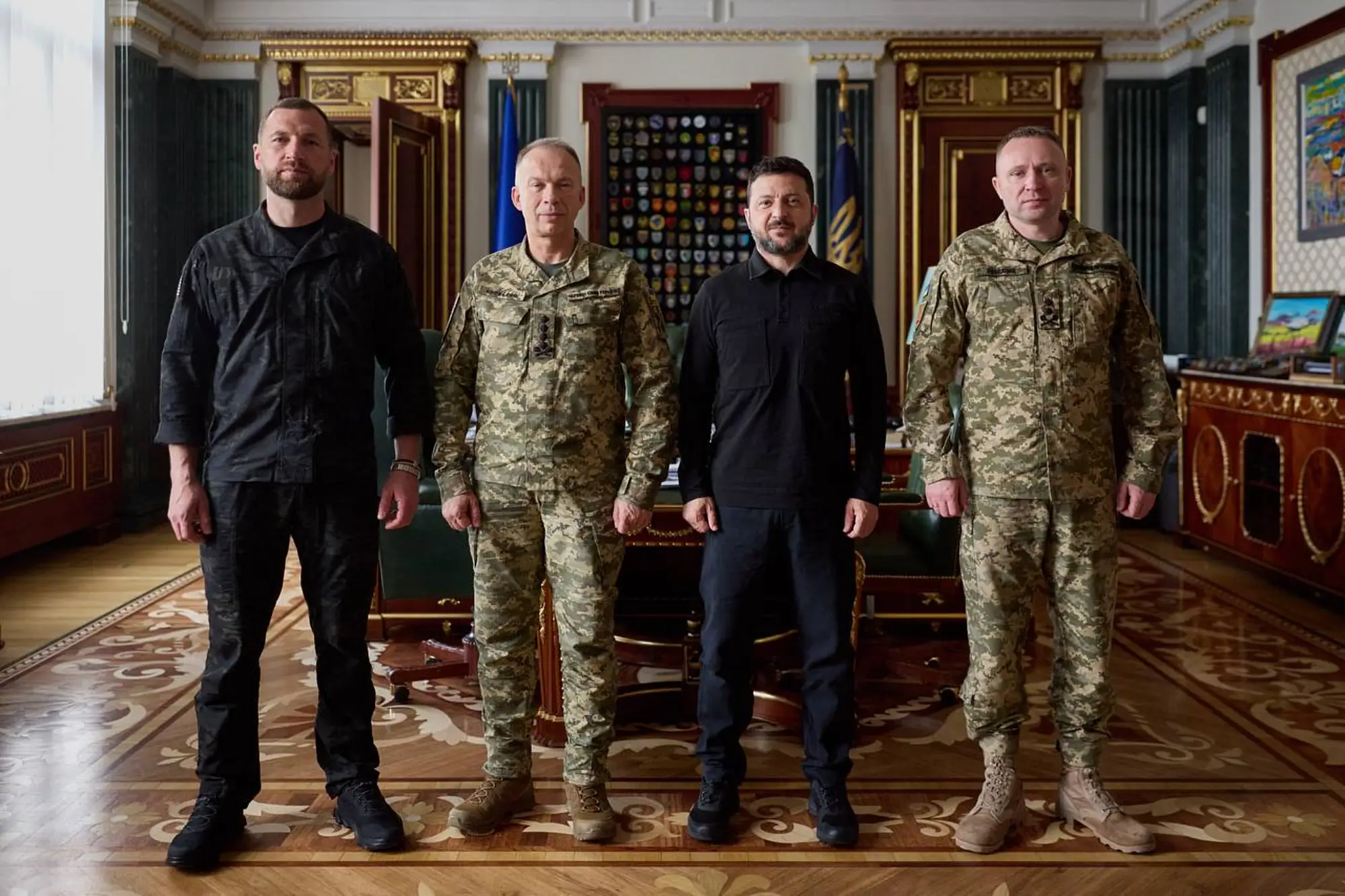 Khmara, Syrskyi, Zelenskyy, and Drapatyi stand together in the presidential office.