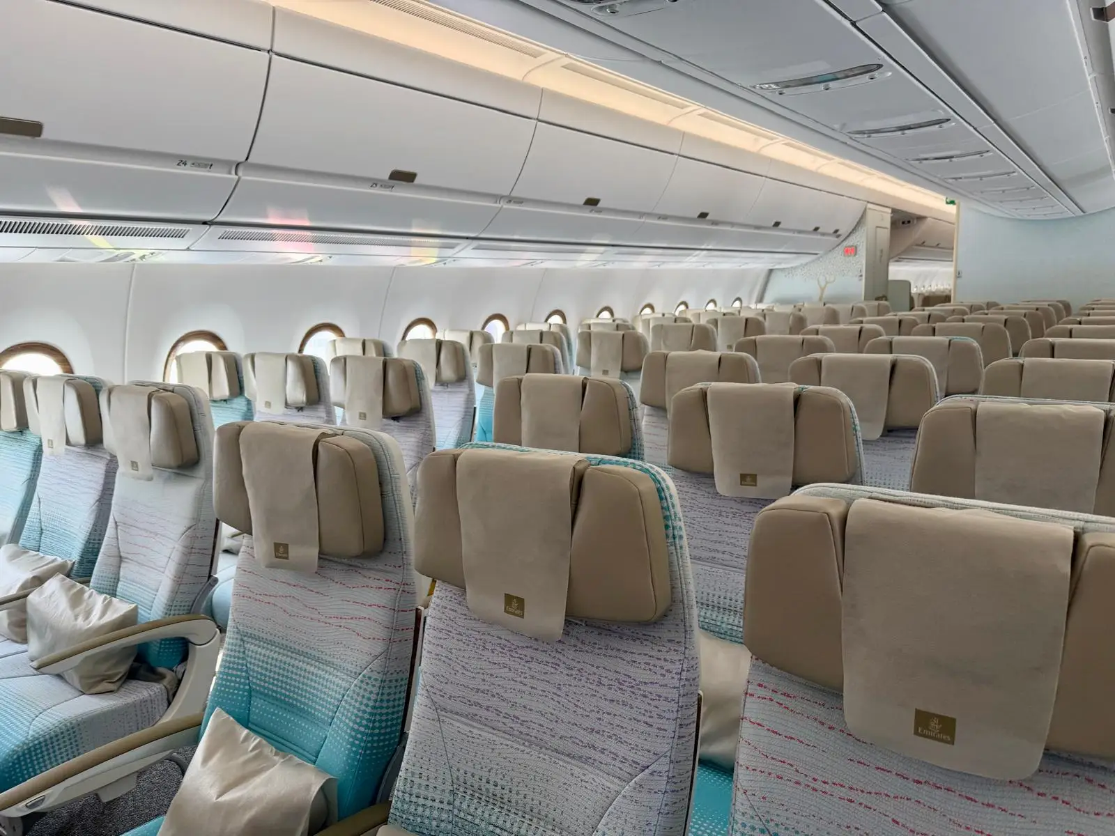 The economy cabin of an Emirates Airbus A350-900 on display at the 2026 Farnborough Airshow