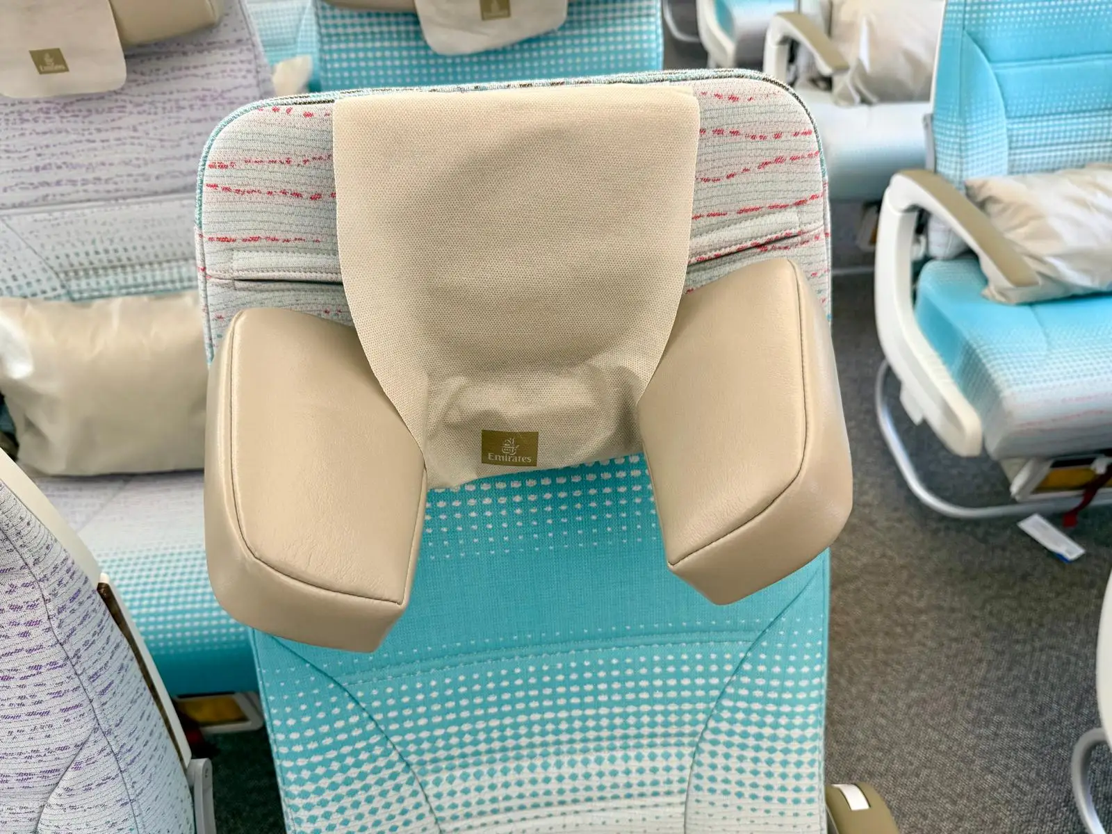A close up of the new headrest on an Emirates Airbus A350-900 on display at the 2026 Farnborough Airshow