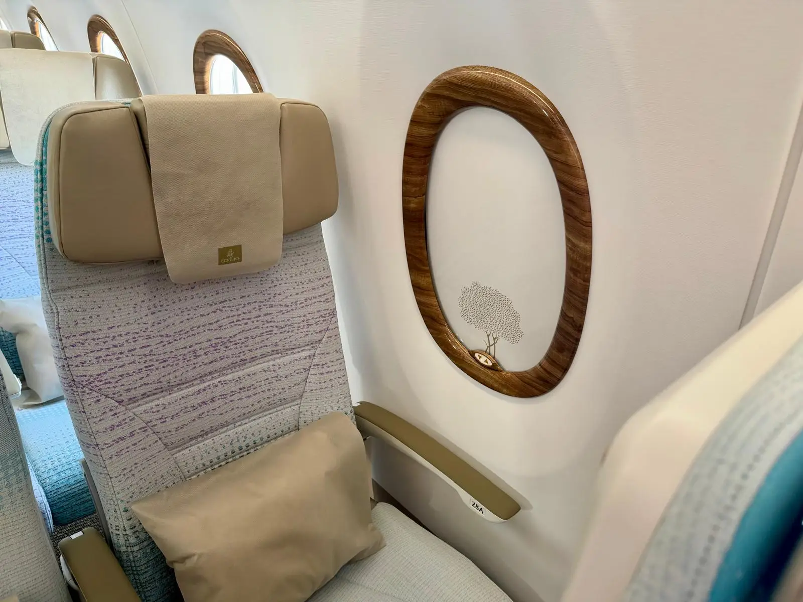 The window on an Emirates Airbus A350 with the shade down.