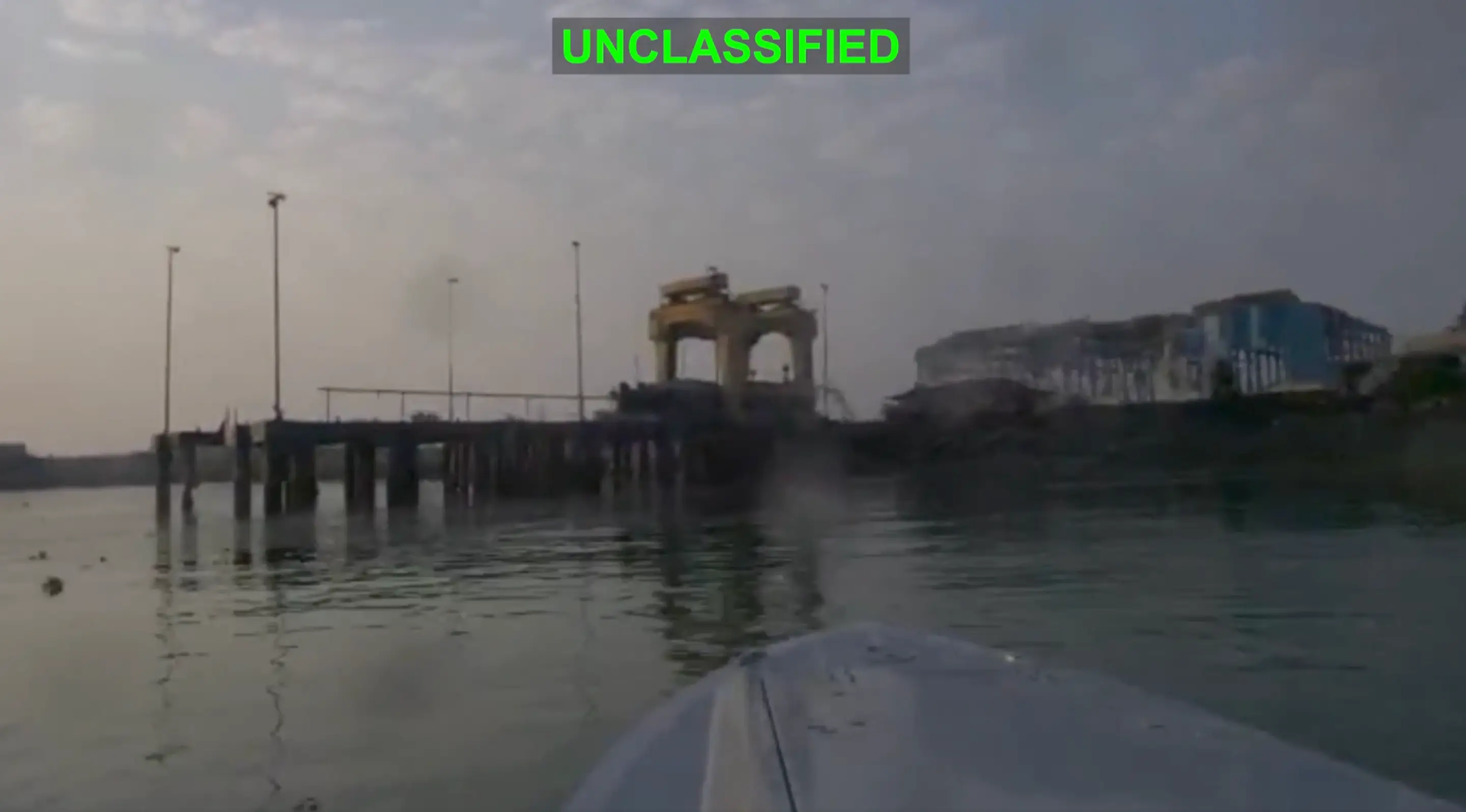 A US sea drone approaches an Iranian port.