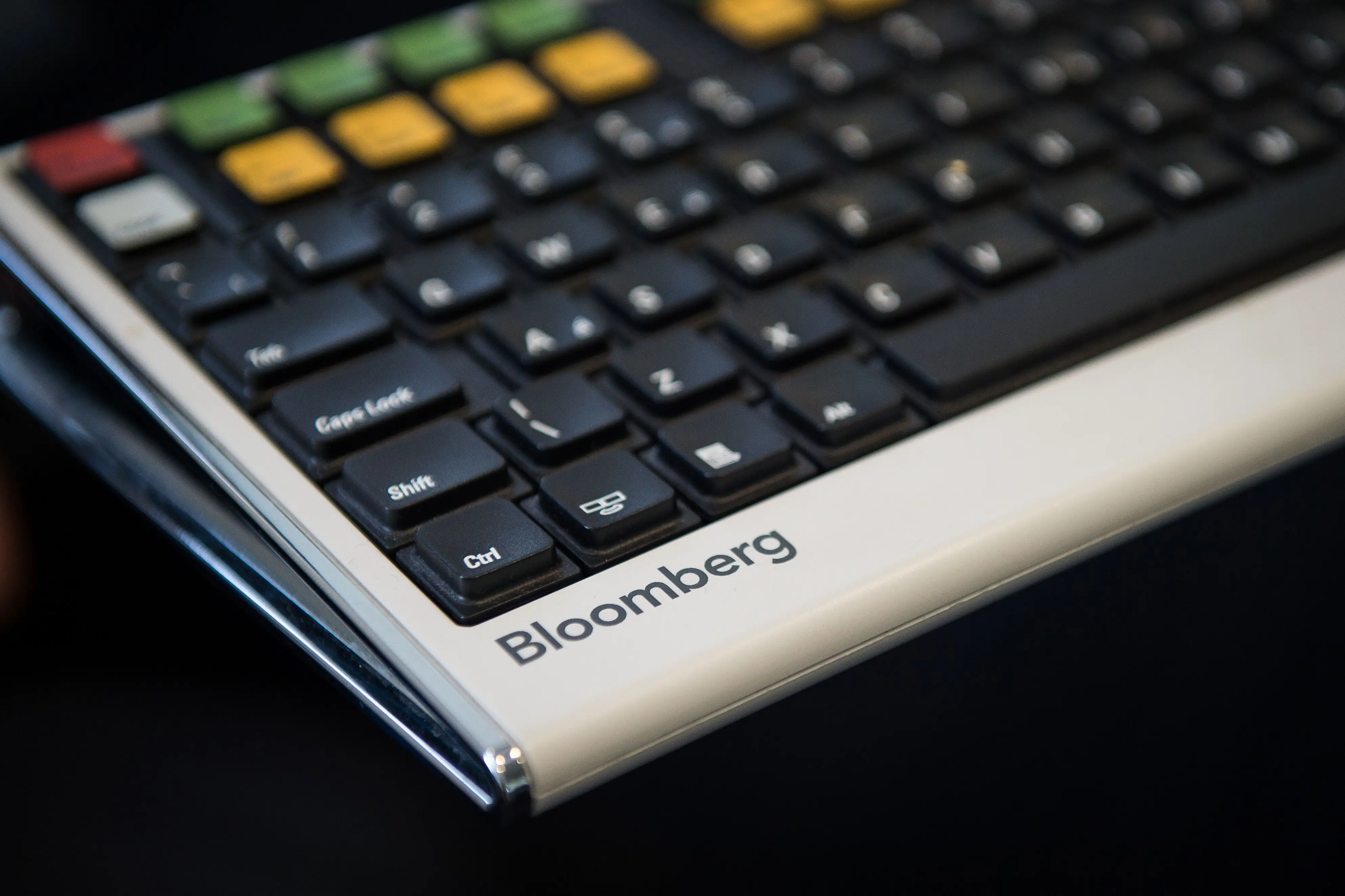 A Bloomberg terminal keyboard is seen.