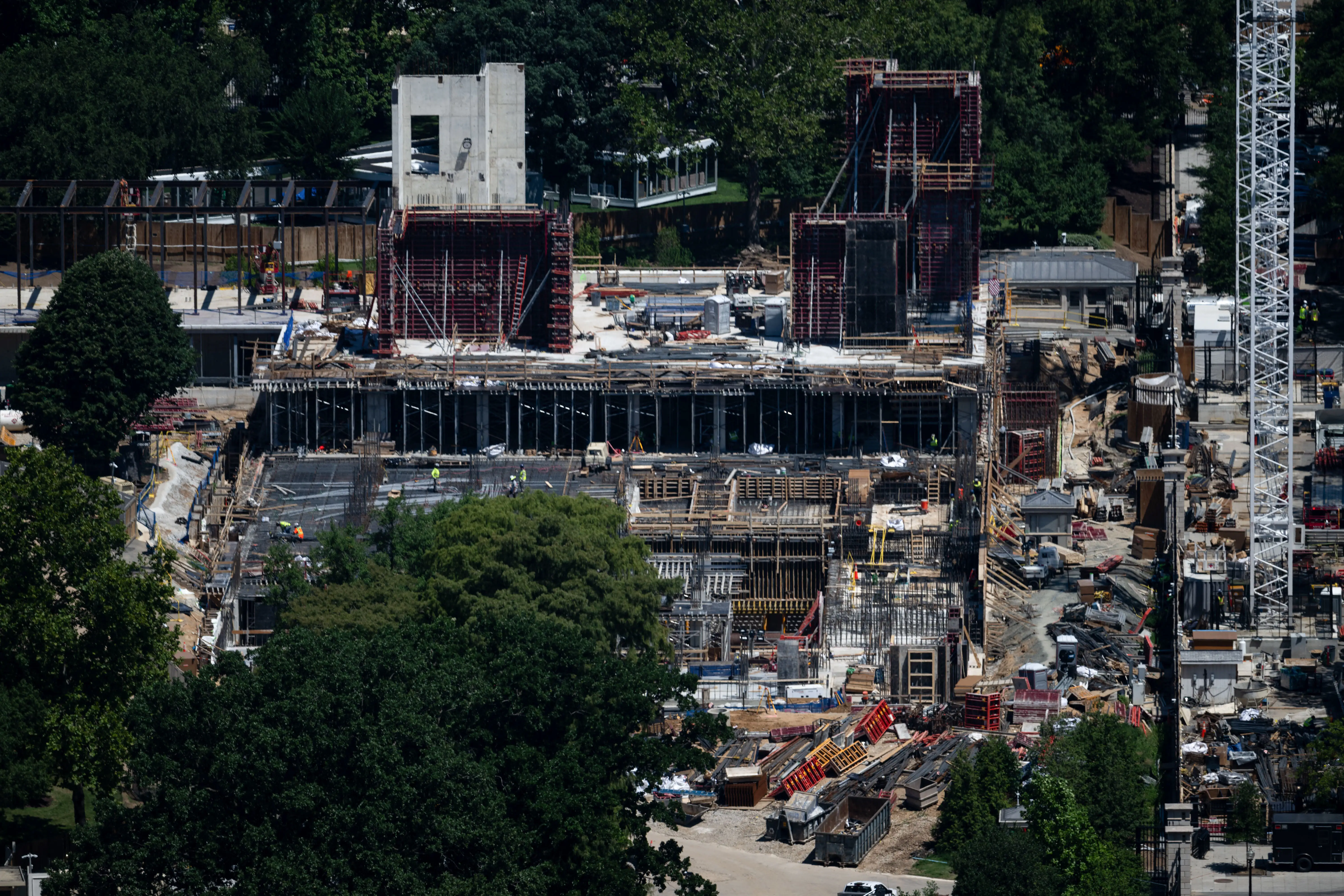 A view of the ongoing construction of a planned ballroom at the White House, as seen from the Washington Monument observation deck in Washington, DC on July 23, 2026