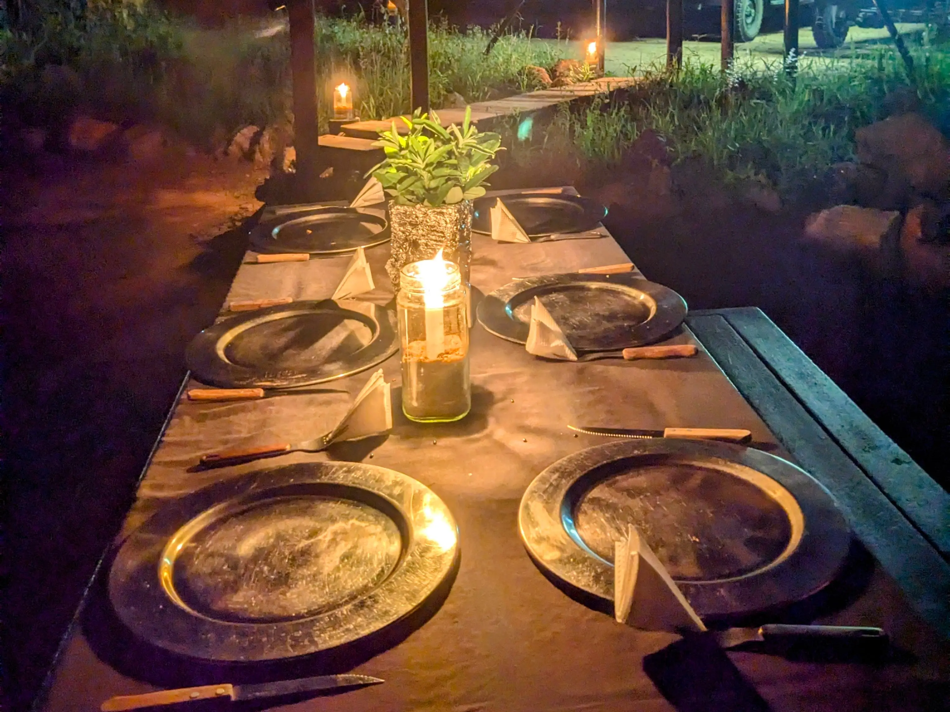 Candle-lit meal outdoors