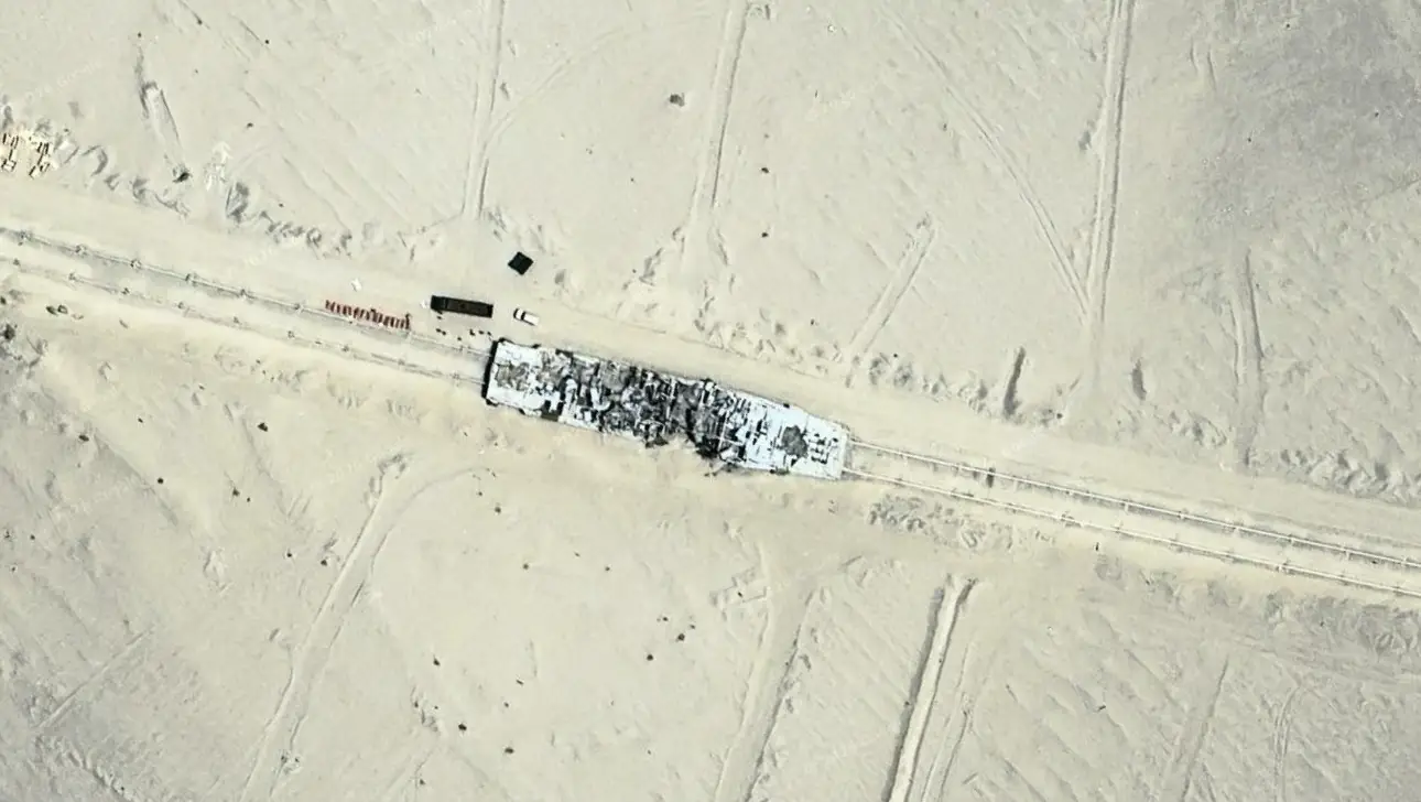 A 23-mile railway provides troops with moving targets like this mock warship.
