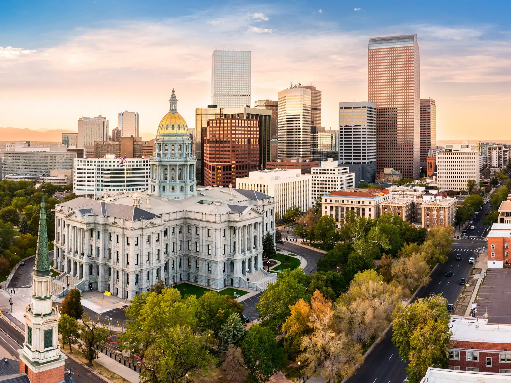 Capitol in front of buildings in Denver, Colorado.