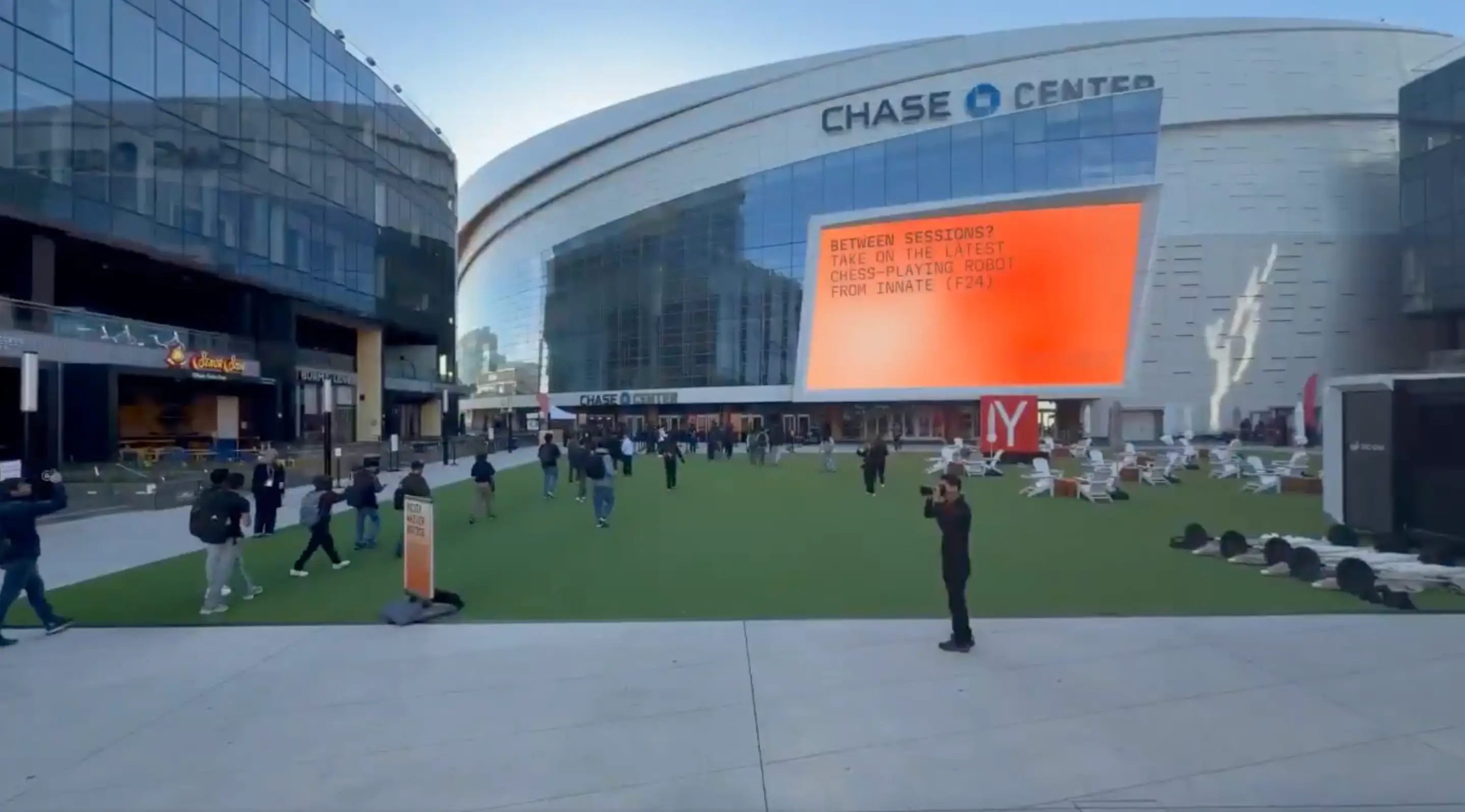 A screenshot of Y Combinator's advertisement for Startup School is pictured.