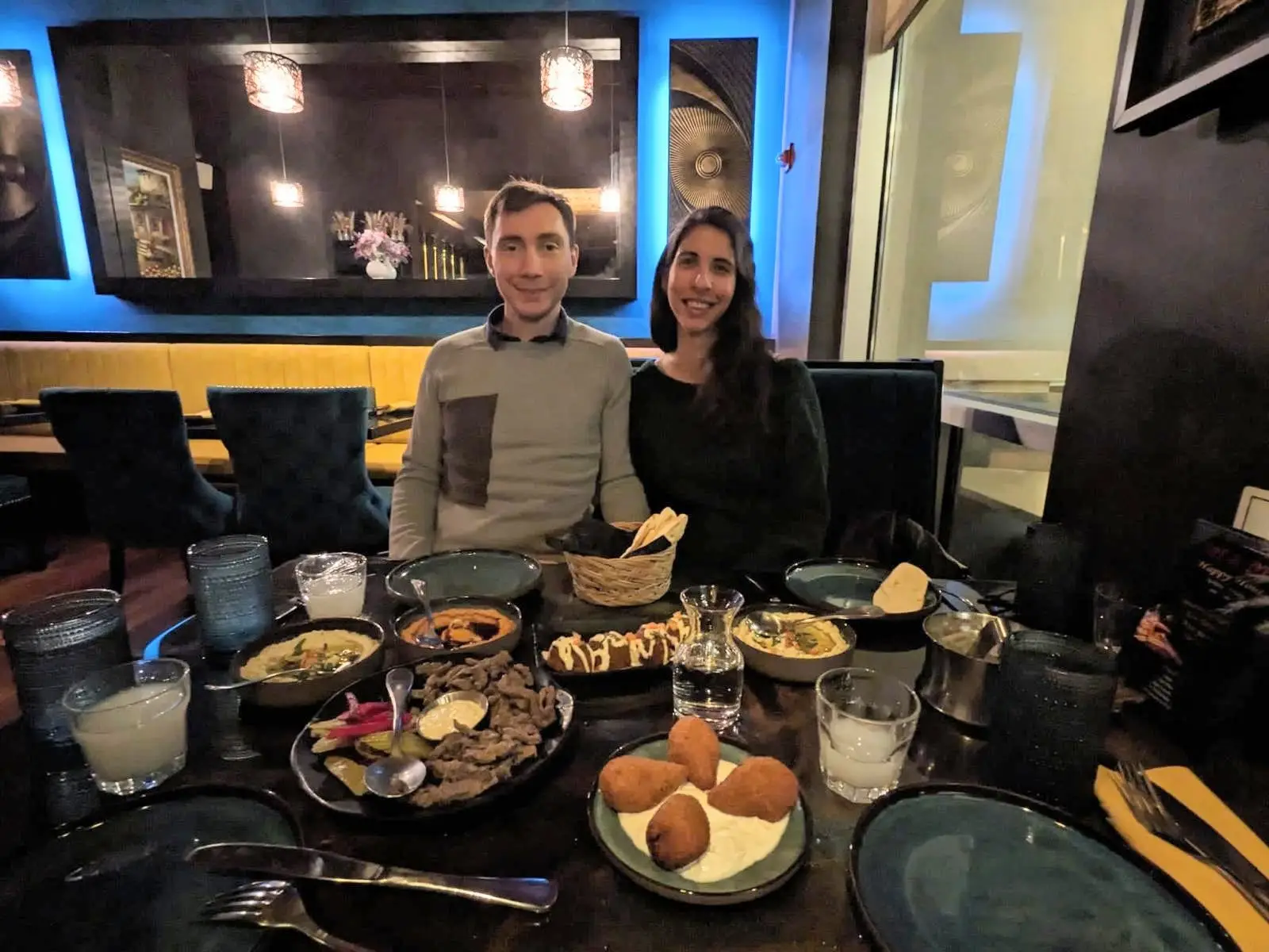 The author and her husband at a restaurant.