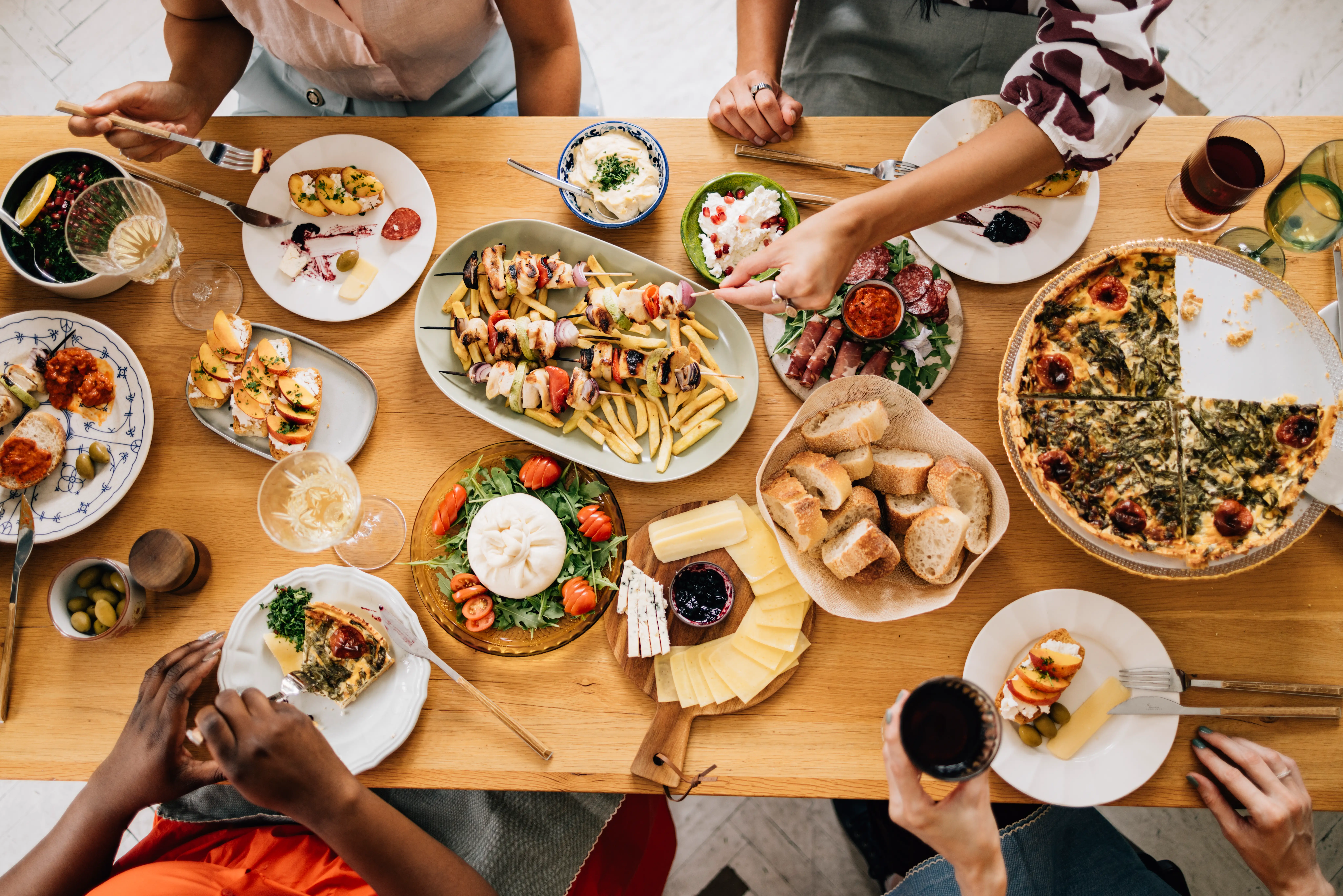 Friends sharing a meal at a restaurant