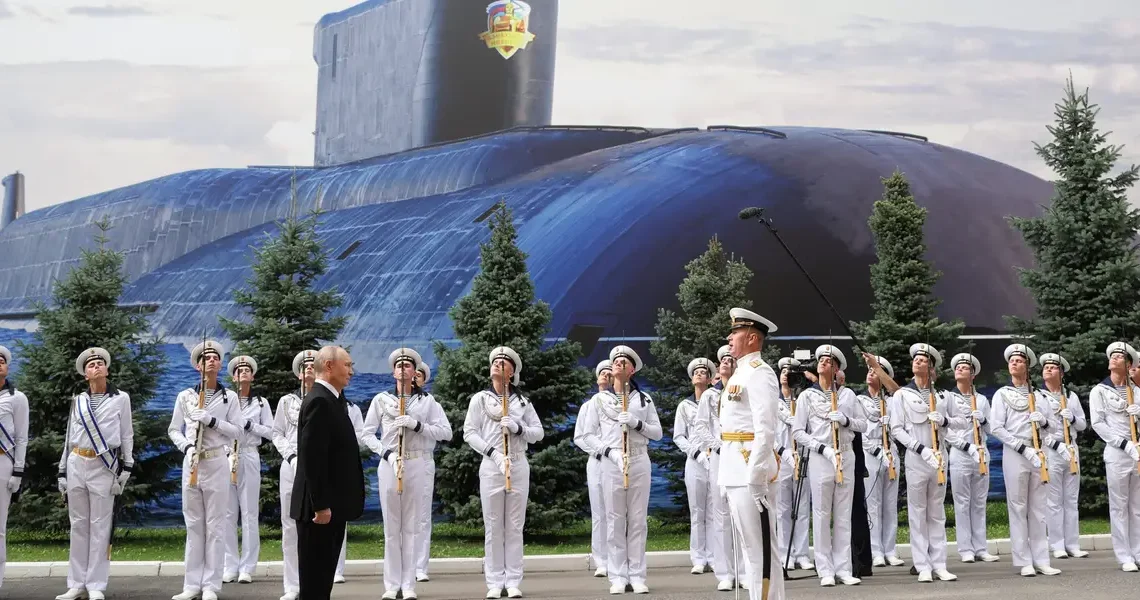 Russia replaced its once-grand Navy Day parade with a shipless event and a giant poster of a submarine