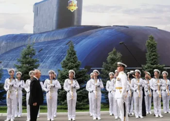 Russia replaced its once-grand Navy Day parade with a shipless event and a giant poster of a submarine