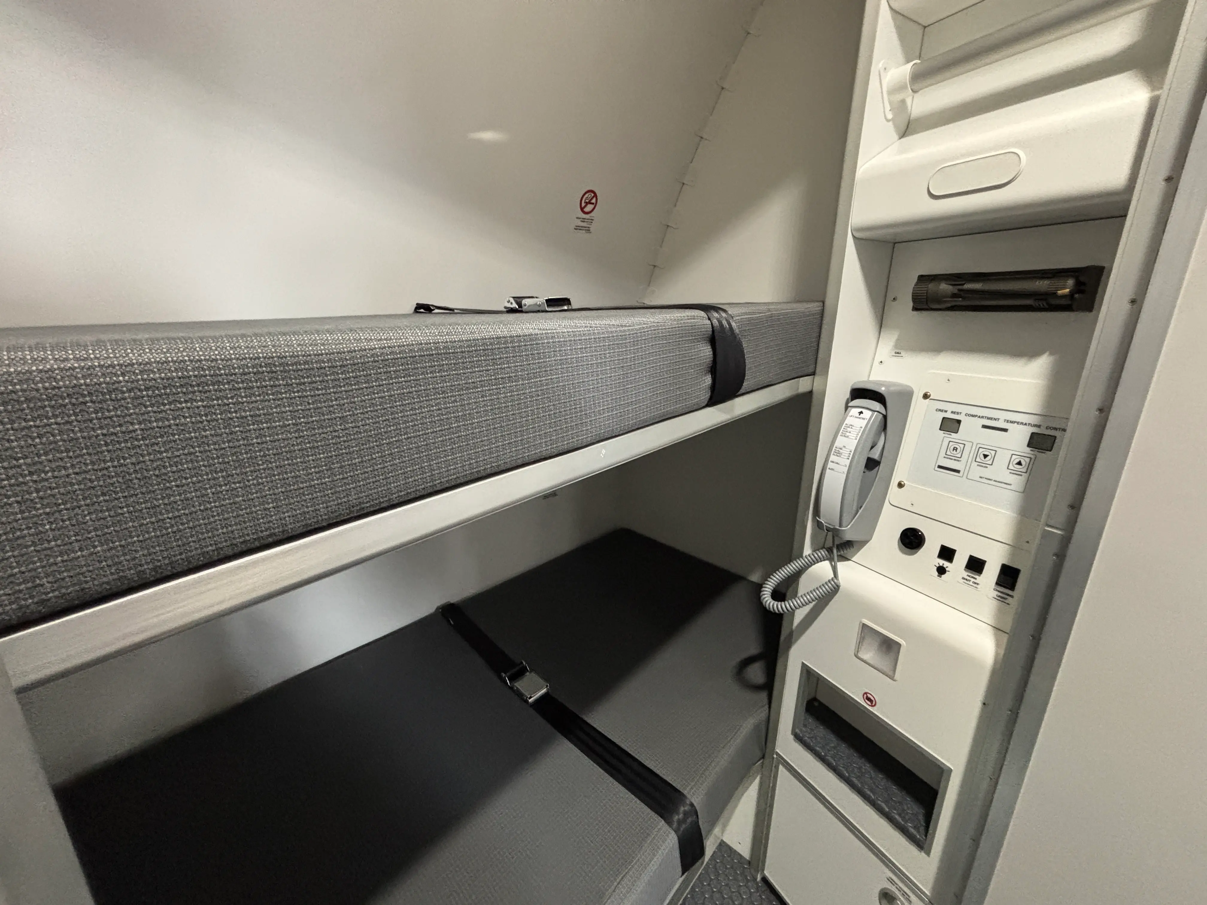 A wide shot of the crew rest area on a DHL Boeing 777