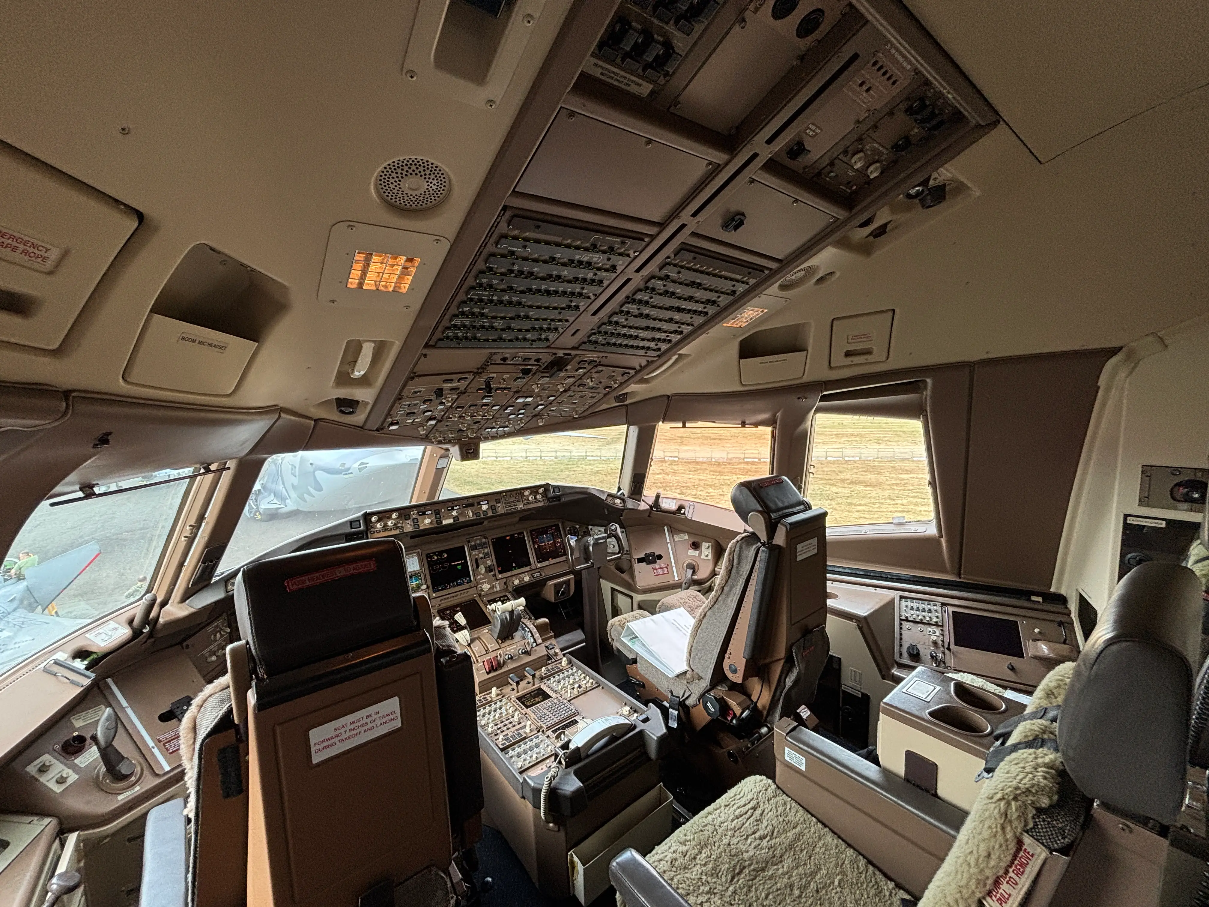 The cockpit of a DHL Boeing 777 on display at the 2026 Farnborough Airshow