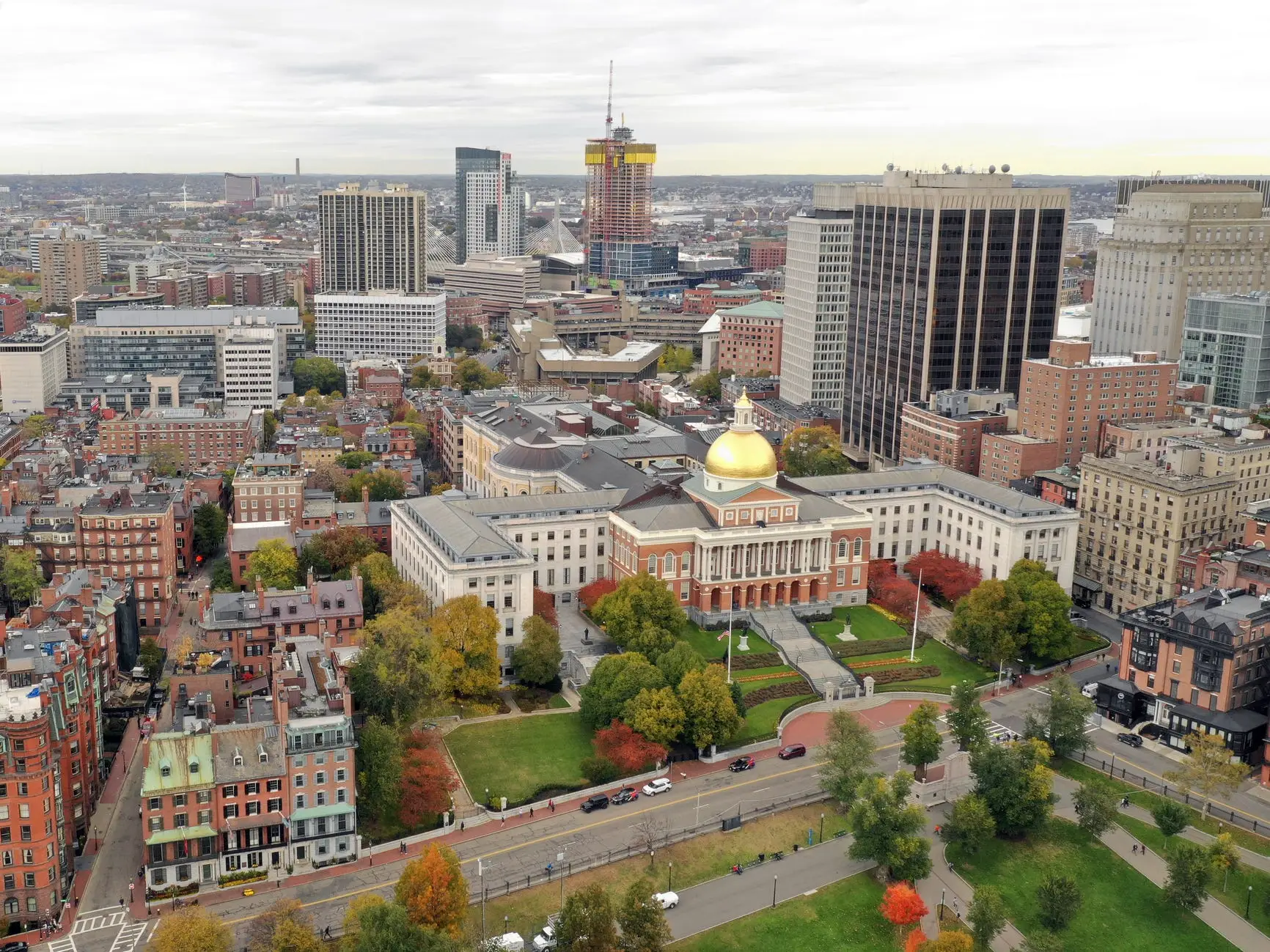 capitol building next to buildings in Boston, Massachusetts.