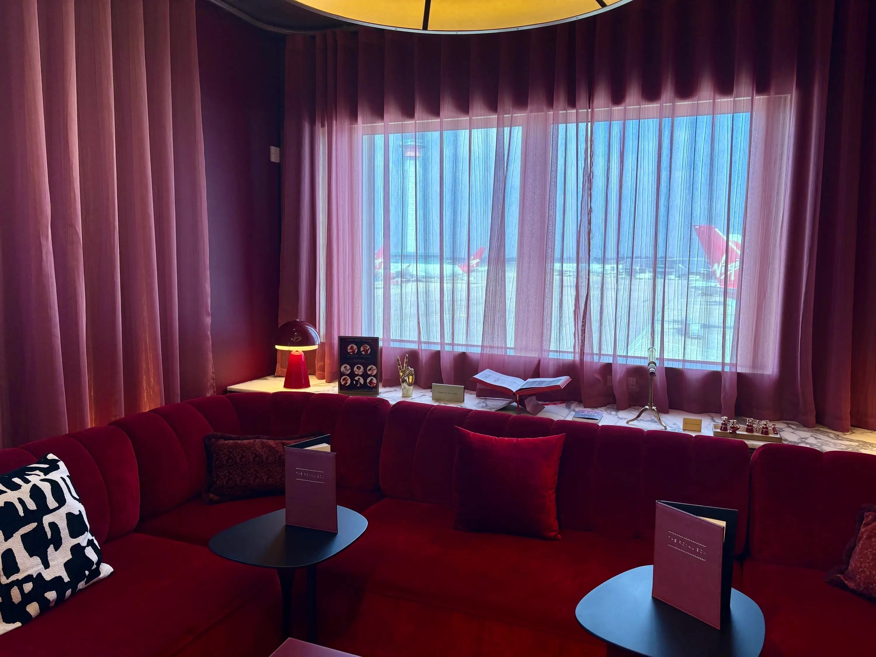 Inside the Royal Box with Virgin planes on the runway in the background.