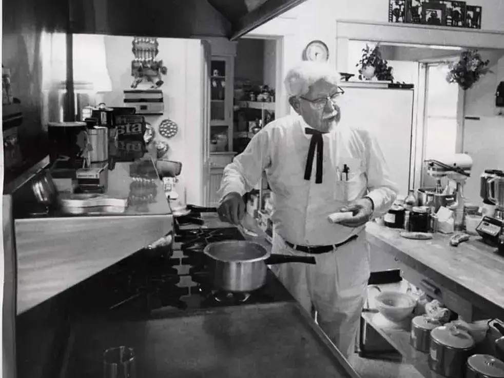Colonel Sanders at home in his kitchen.