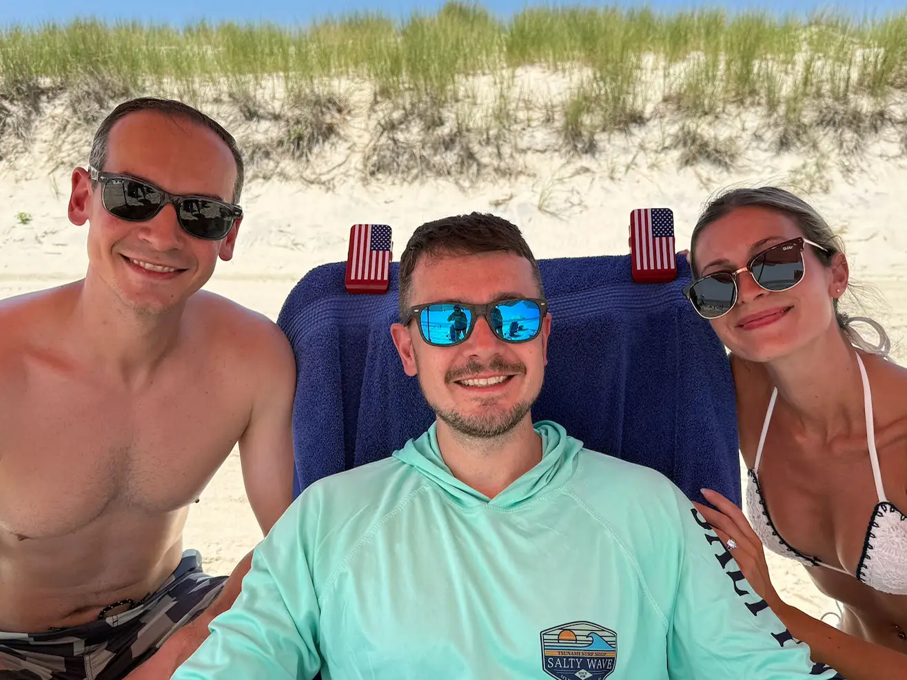 Alexa and two of her cousins pose for a photo on the beach.