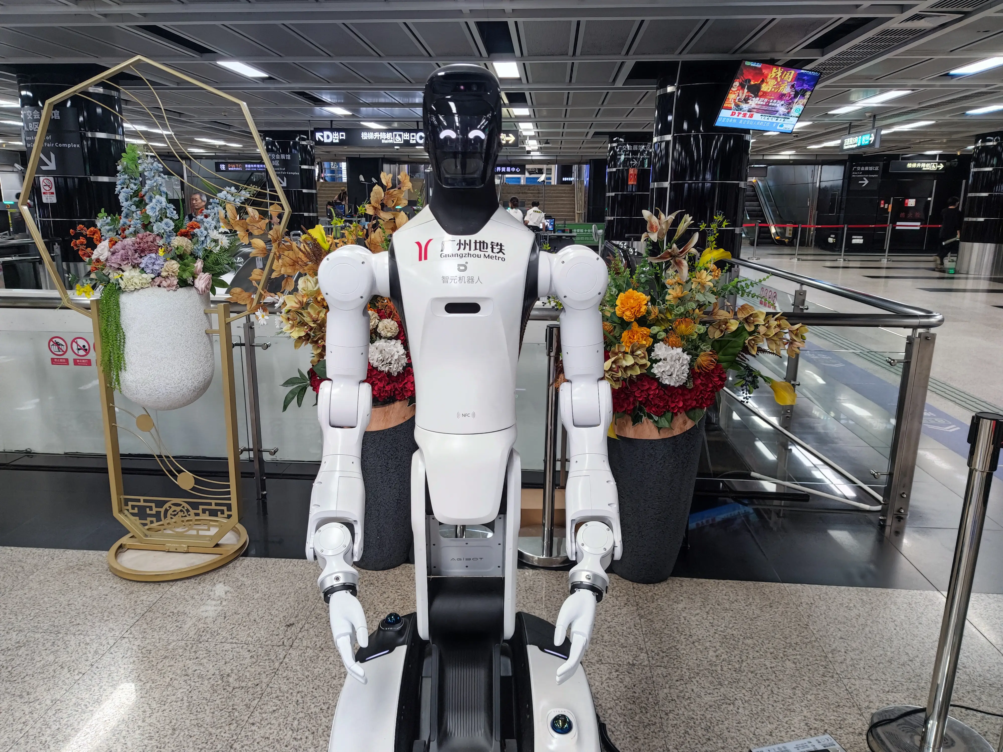 GUANGZHOU, CHINA - JULY 27: An AgiBot intelligent robot works at a metro station to serve passengers on July 27, 2026 in Guangzhou, Guangdong Province of China. (Photo by VCG/VCG via Getty Images)