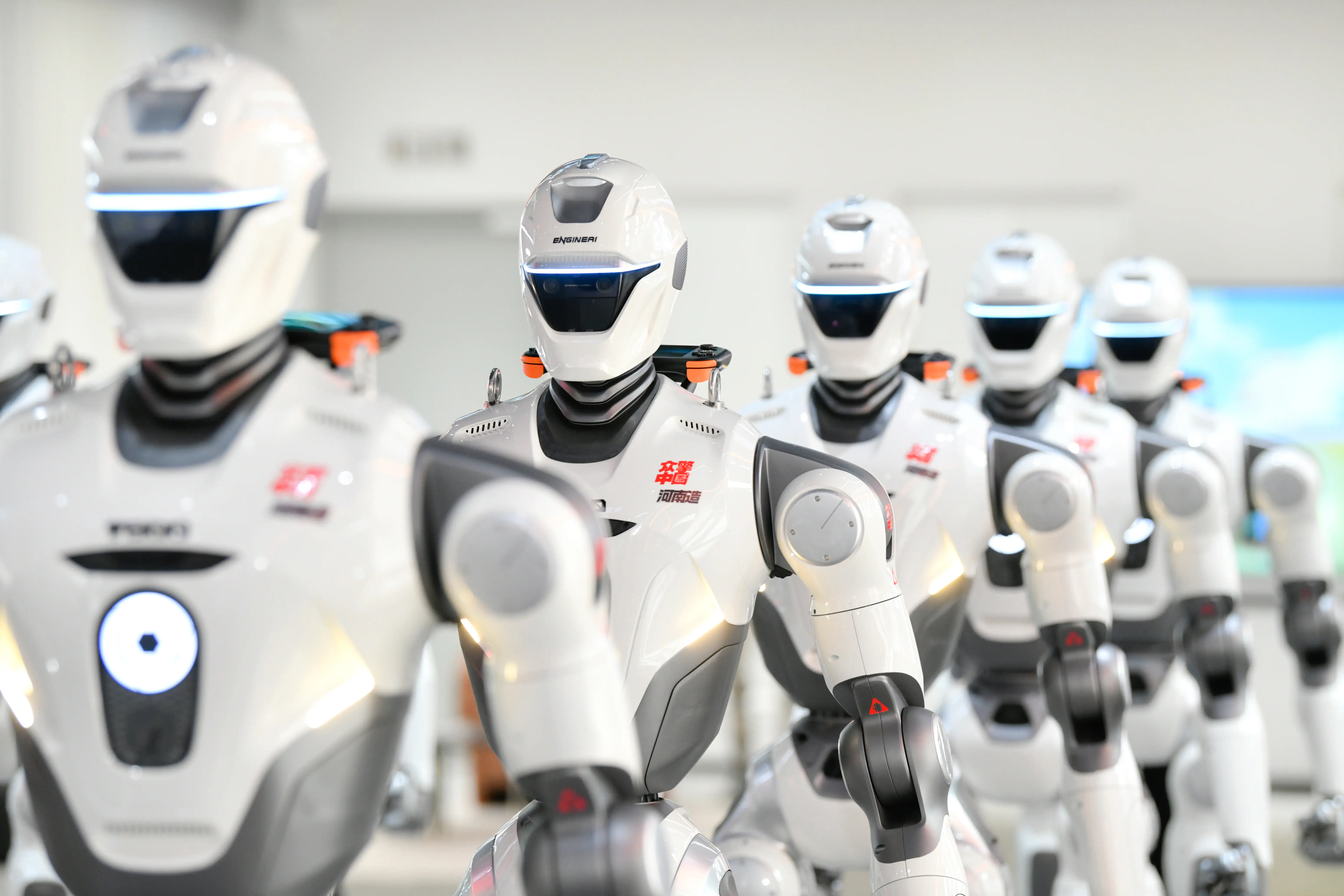 EngineAI T800 humanoid robots are on display after rolling off the production line at a production facility on July 24, 2026 in Zhengzhou, Henan Province of China.