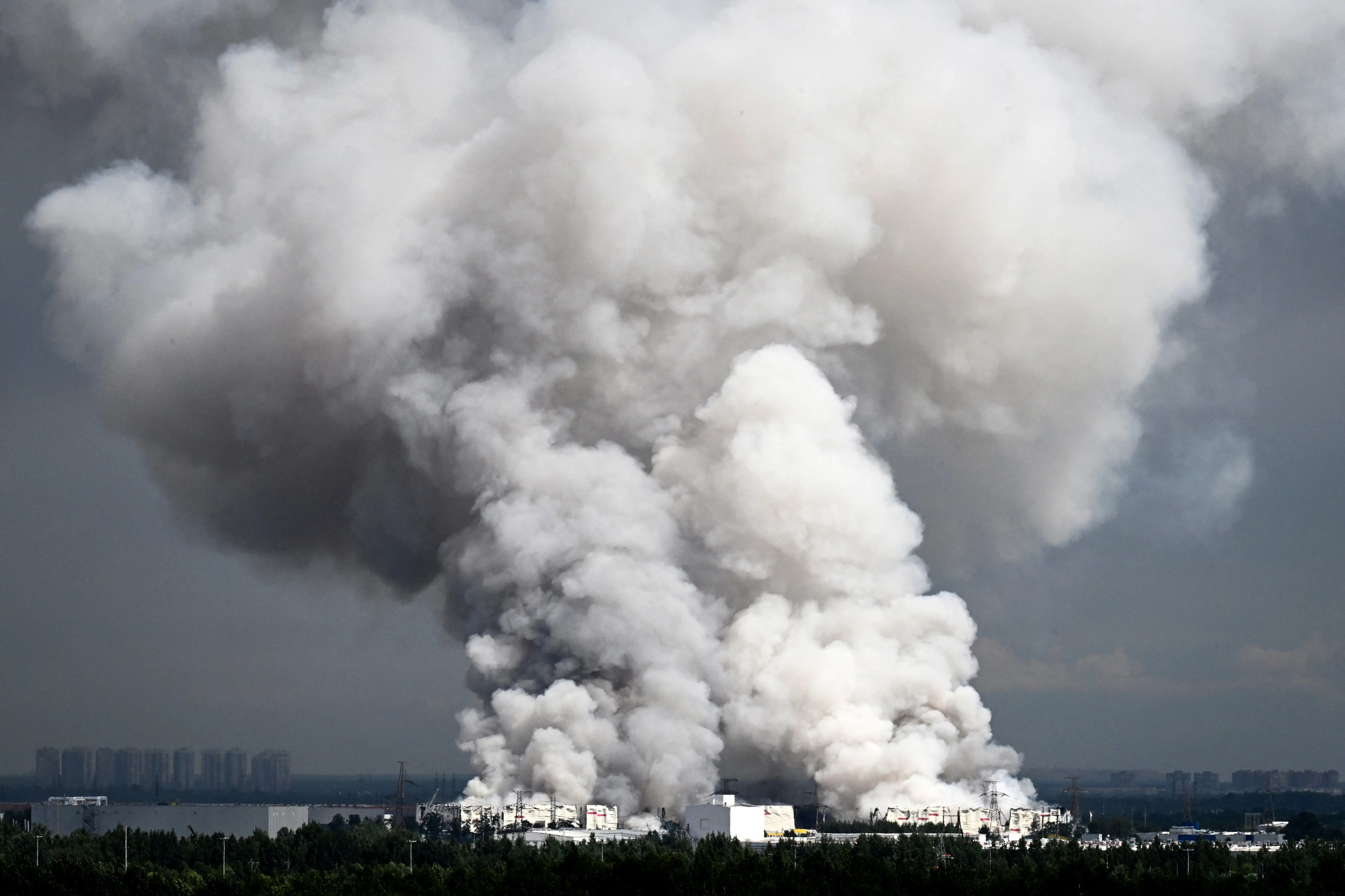 Smoke rises from e-commerce warehouses in St. Petersburg.