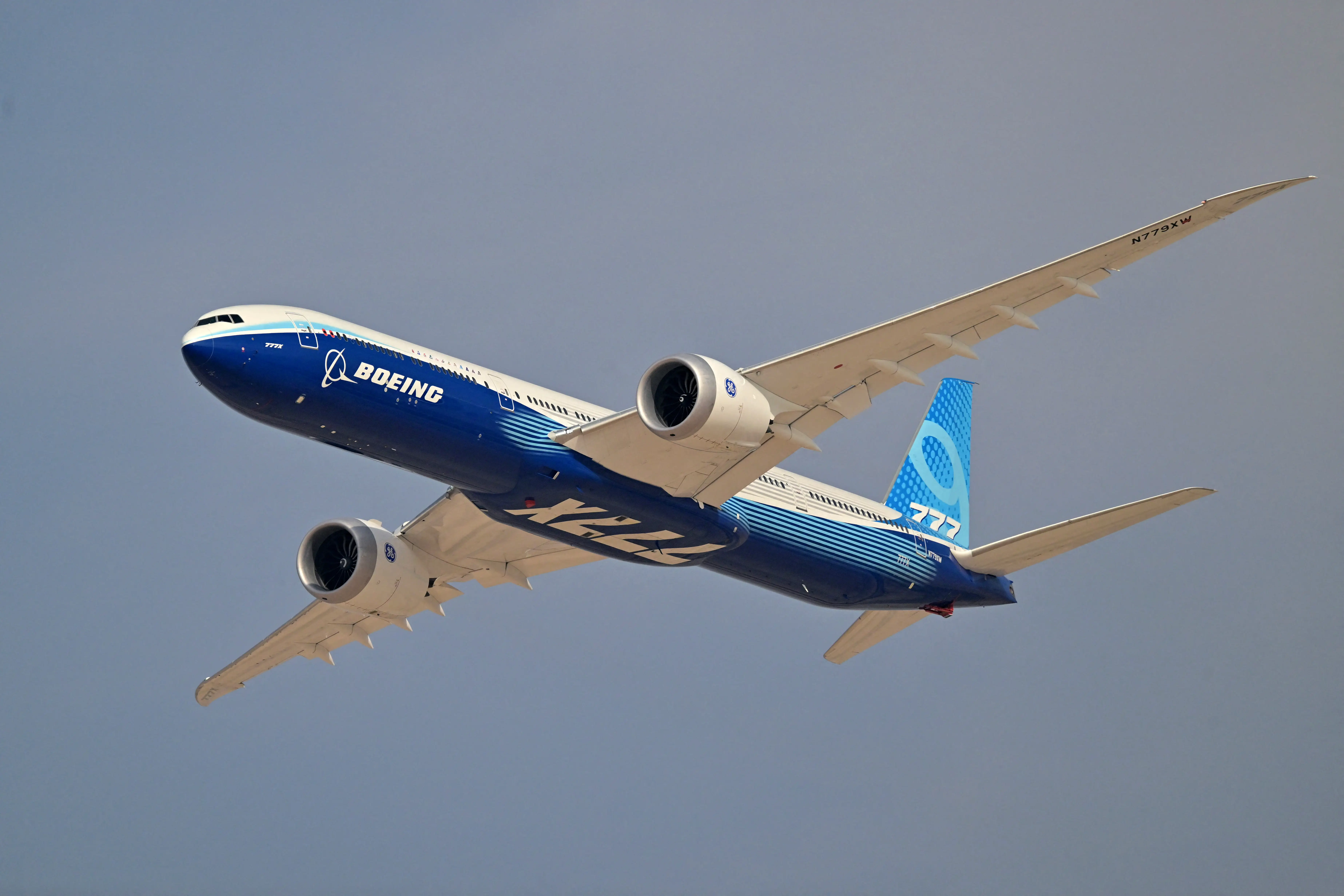 A Boeing 777-9 prepares to land at Al-Maktoum International Airport during the Dubai Airshow 2025 in Dubai on November 17, 2025.
