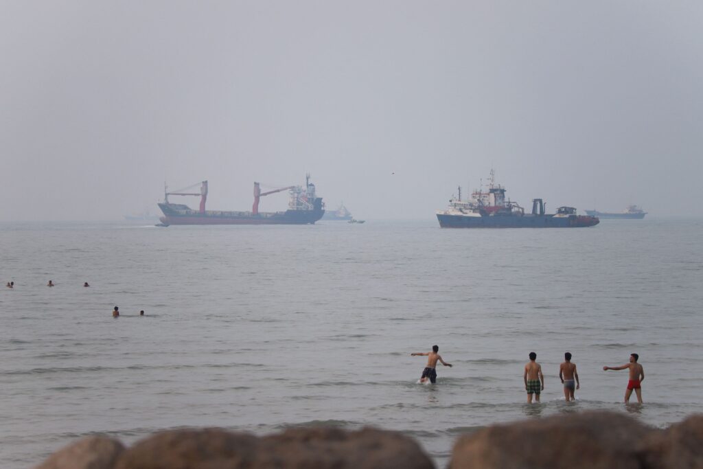 Tanker set on fire after being struck in Strait of Hormuz, British military says