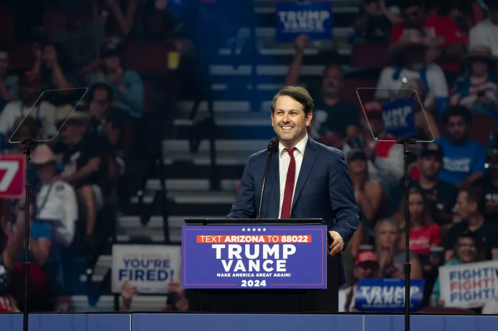 Turning Point USA chief operating officer speaks during a campaign rally for President Donald Trump in Glendale, Arizona, on Aug. 23, 2024.