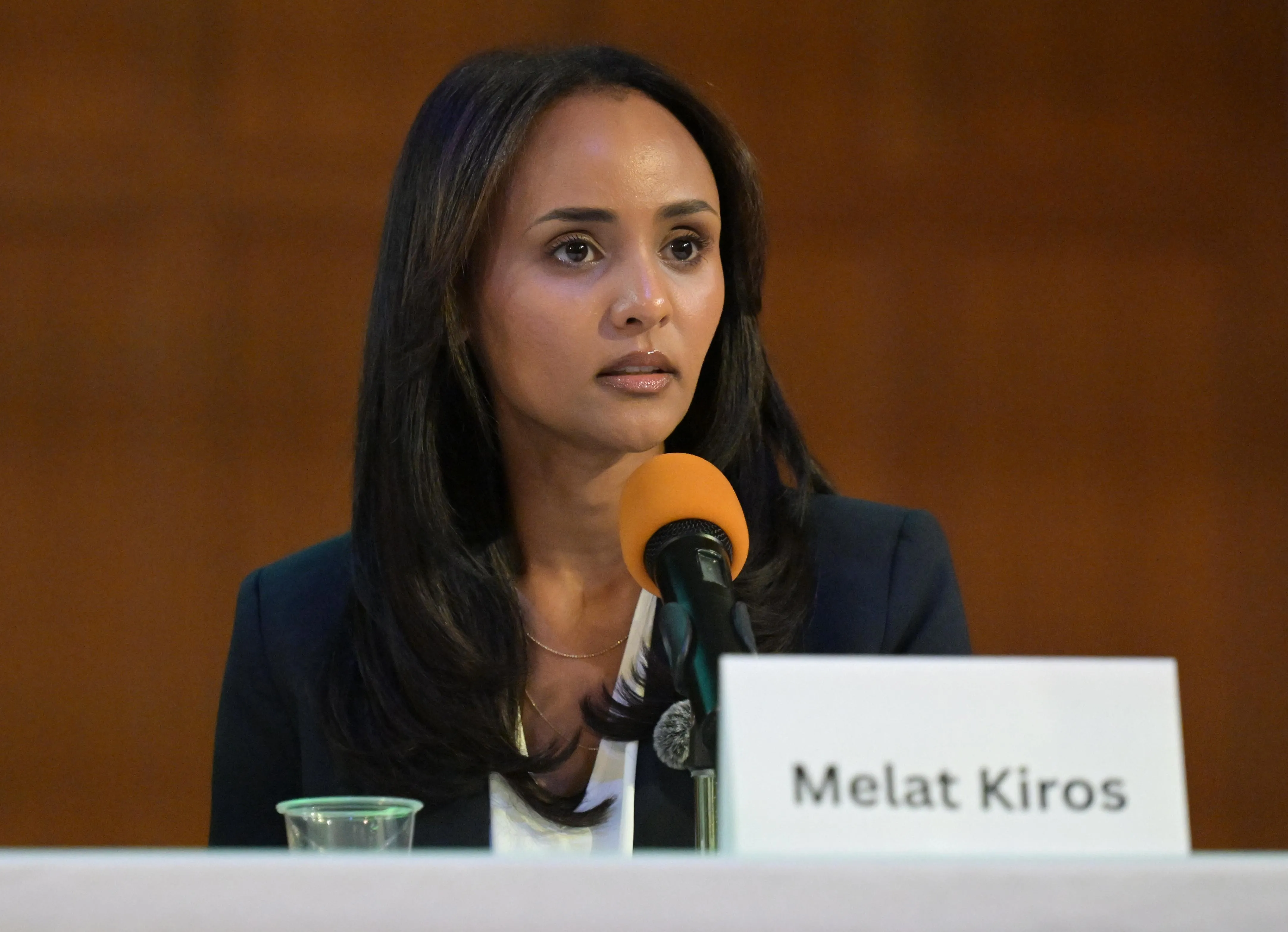  Kiros sitting in front of a microphone
