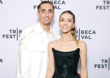 Netflix Doc Stars Climb the Empire State Building in Gravity-Defying Wedding Engagement Stunt