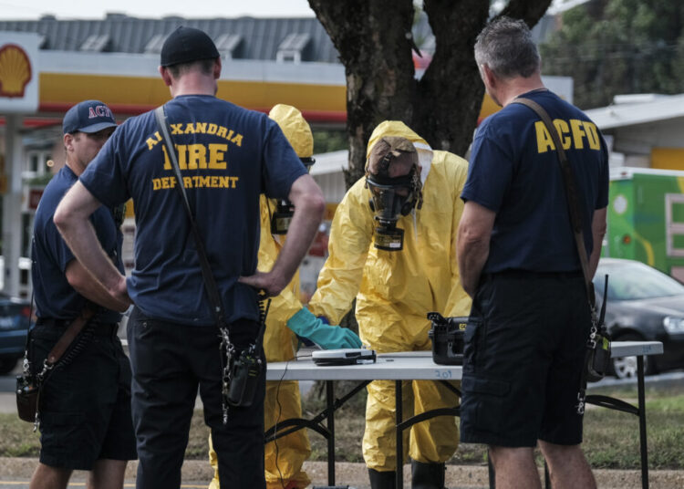 Cleanup underway after hazardous material closes major Alexandria road