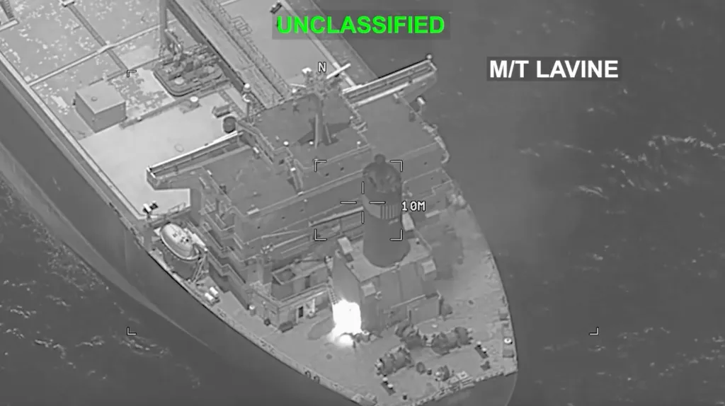 Overhead thermal image of the M/T LAVINE ship with a bright spot visible on the deck near the bow.