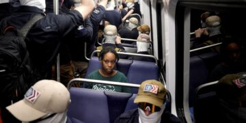 What a viral photo of white supremacists on the Metro reveals