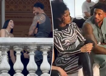 Cardi B and Nigerian soccer star Maduka Okoye set tongues wagging with Paris Fashion Week flirt fest