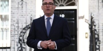 A U.K. prime minister takes charge with a promise to dilute power