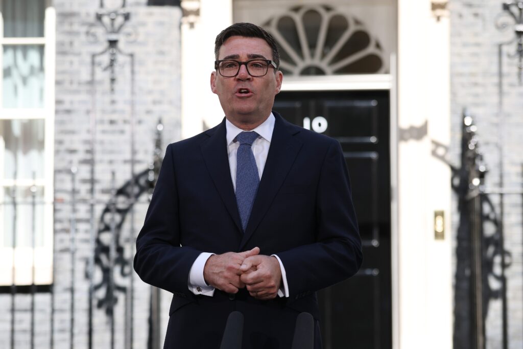 A U.K. prime minister takes charge with a promise to dilute power
