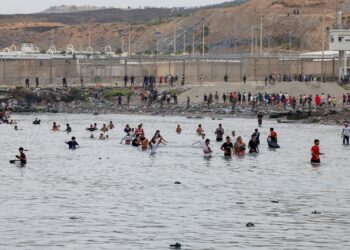 Migrants overrun a Spanish outpost, stirring European outrage