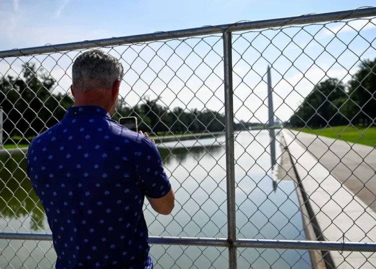Tarps hiding drained Reflecting Pool raise suspicions about Trump’s vandalism claim