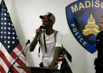 ‘Give me this microphone!’ Chaos as protesters take over police chief’s press conference