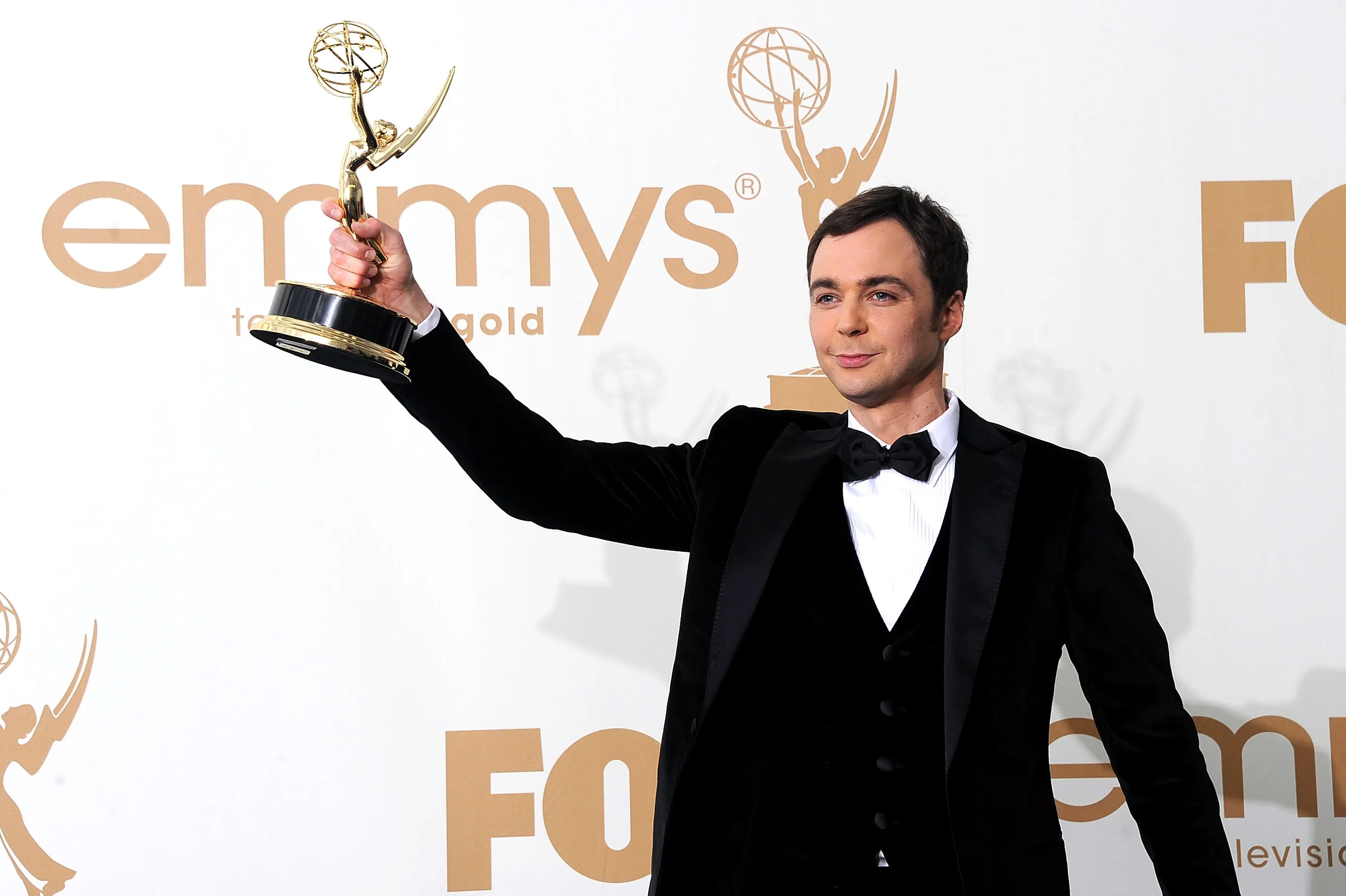 Jim Parsons celebrates after winning Outstanding lead actor at the 2011 Primetime Emmy Awards.