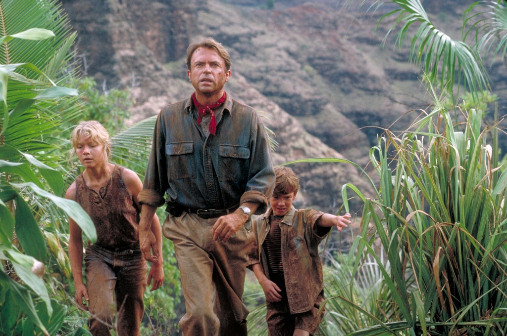 Sam Neill as Dr. Alan Grant, with Ariana Richards as Lex and Joseph Mazzello as Tim, in Jurassic Park (1993).